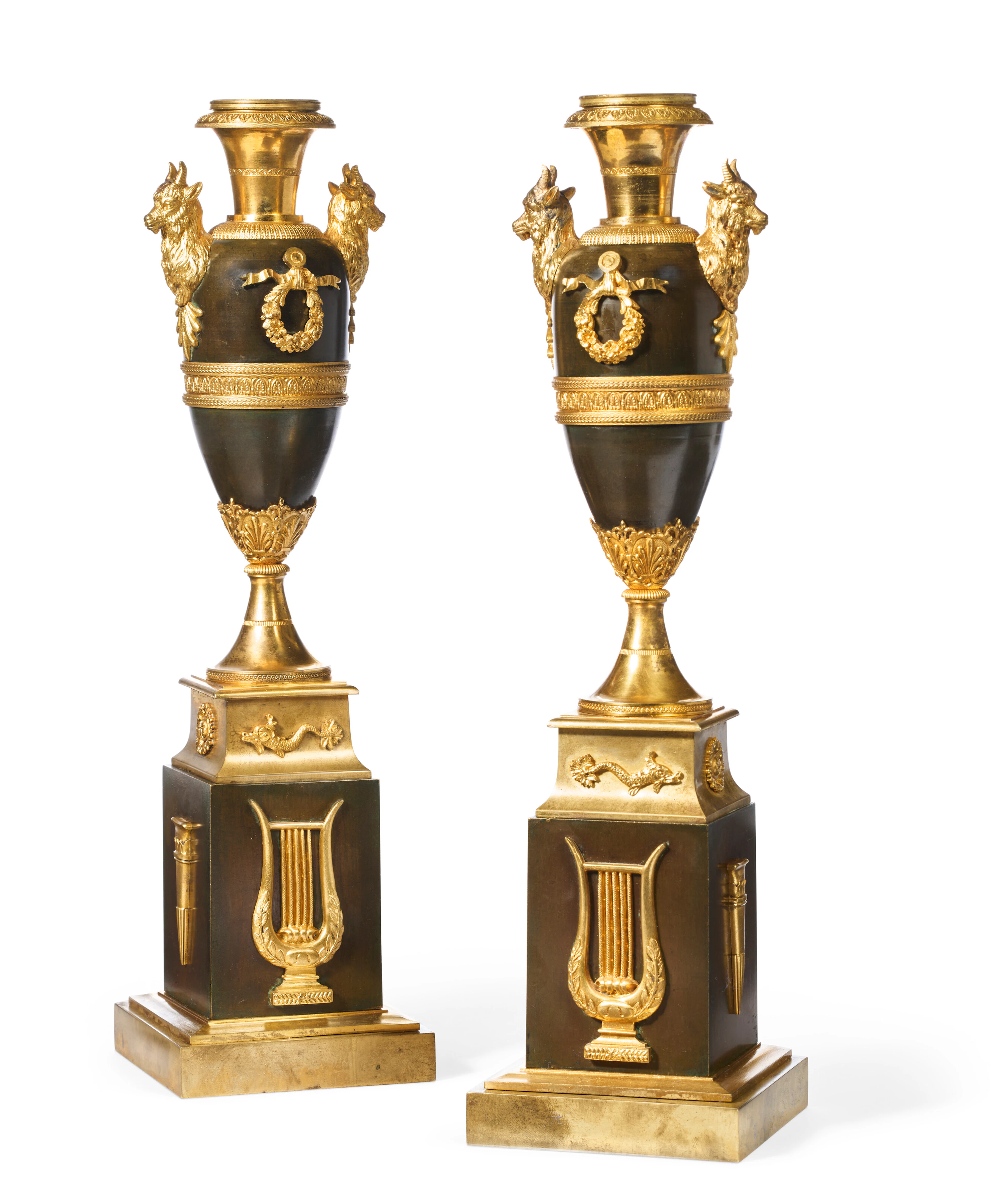 A Pair of North European Ormolu and Patinated Bronze Candlesticks
