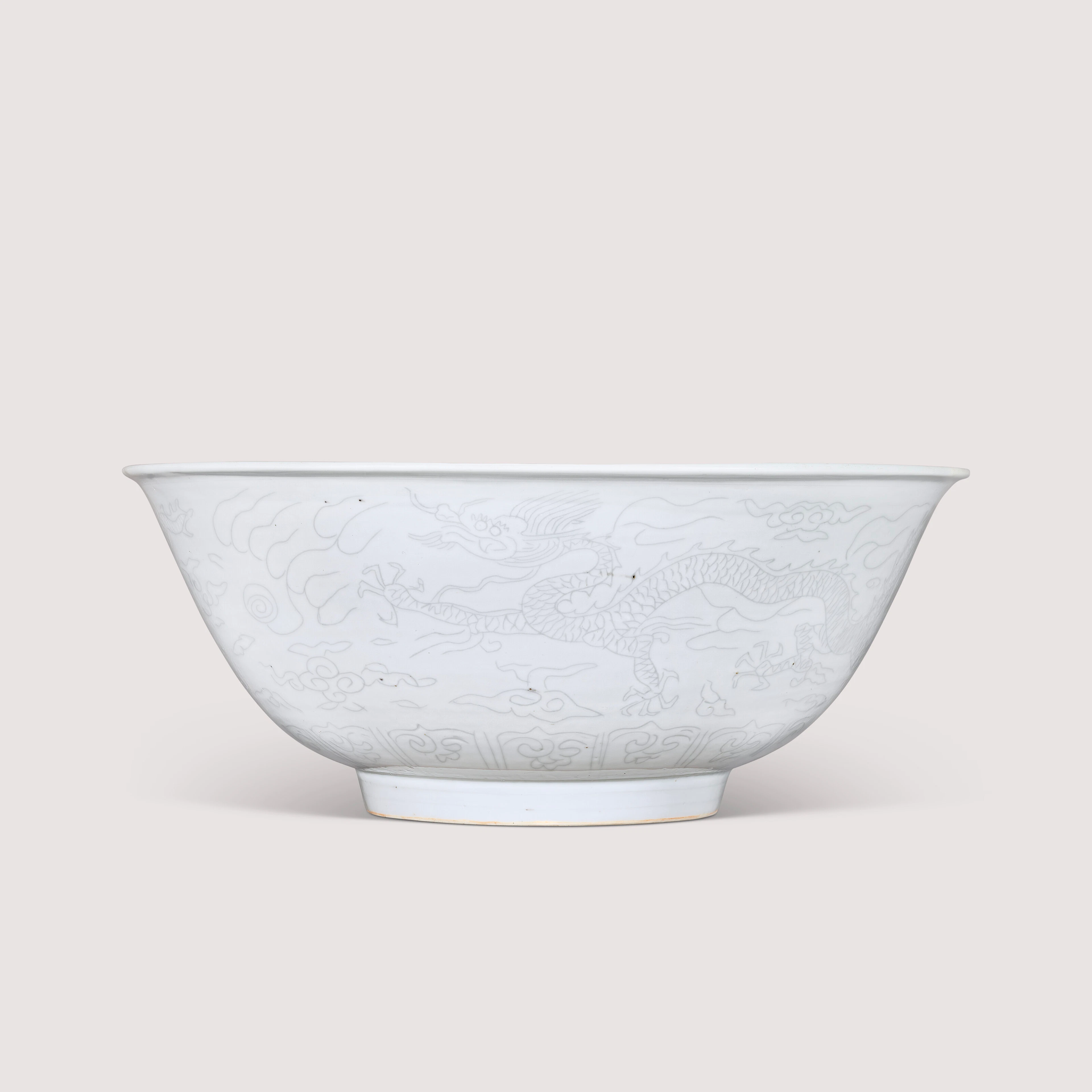 A Rare Large Anhua- Decorated White-Glazed ‘Dragon’ Bowl