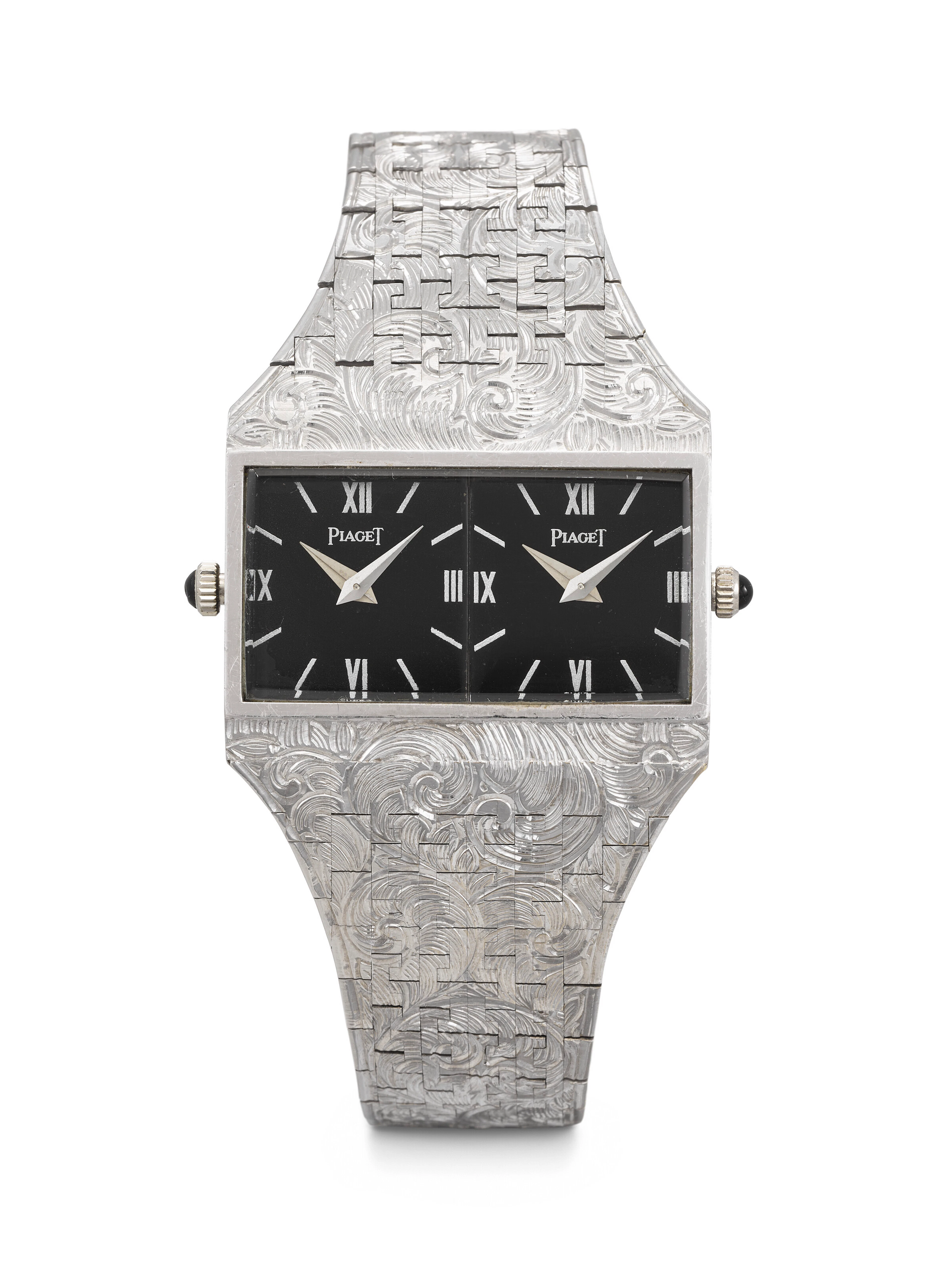 Piaget. An Elegant and Intricately Hand-Engraved 18K White Gold Dual