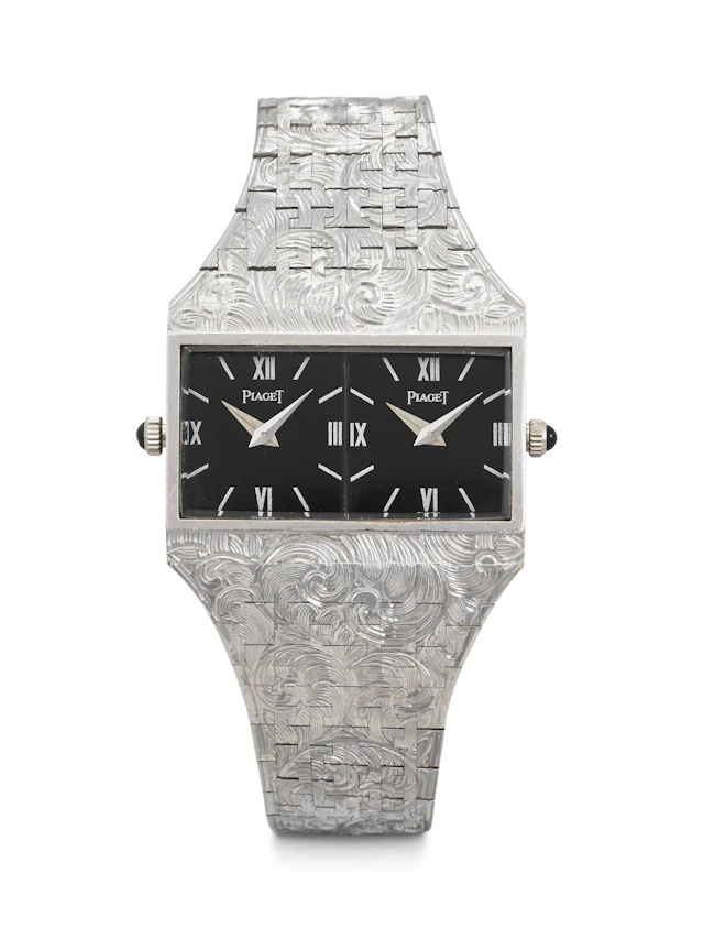 Piaget. An Elegant and Intricately Hand-Engraved 18K White Gold Dual
