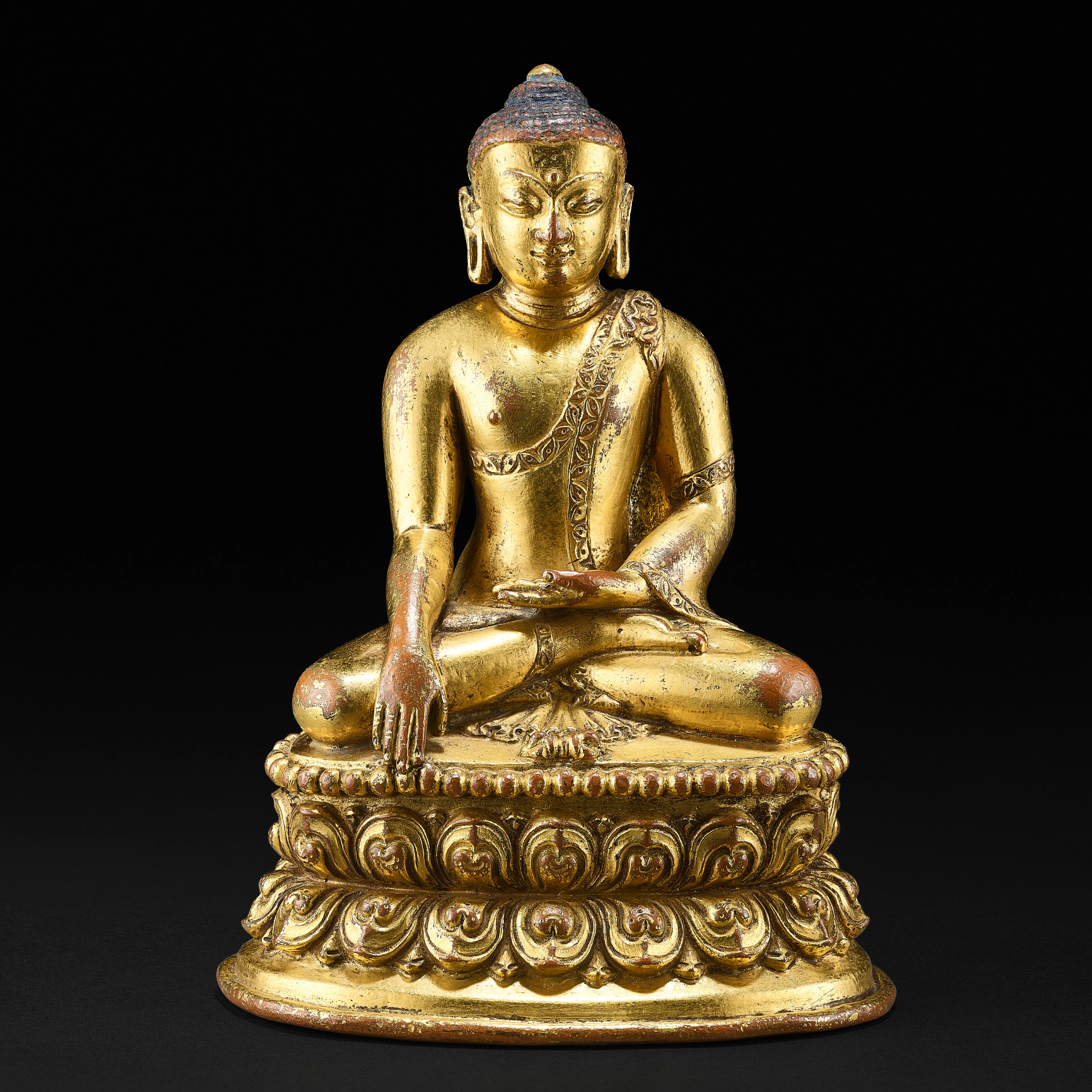 A Gilt Copper Alloy Figure of Shakyamuni Buddha