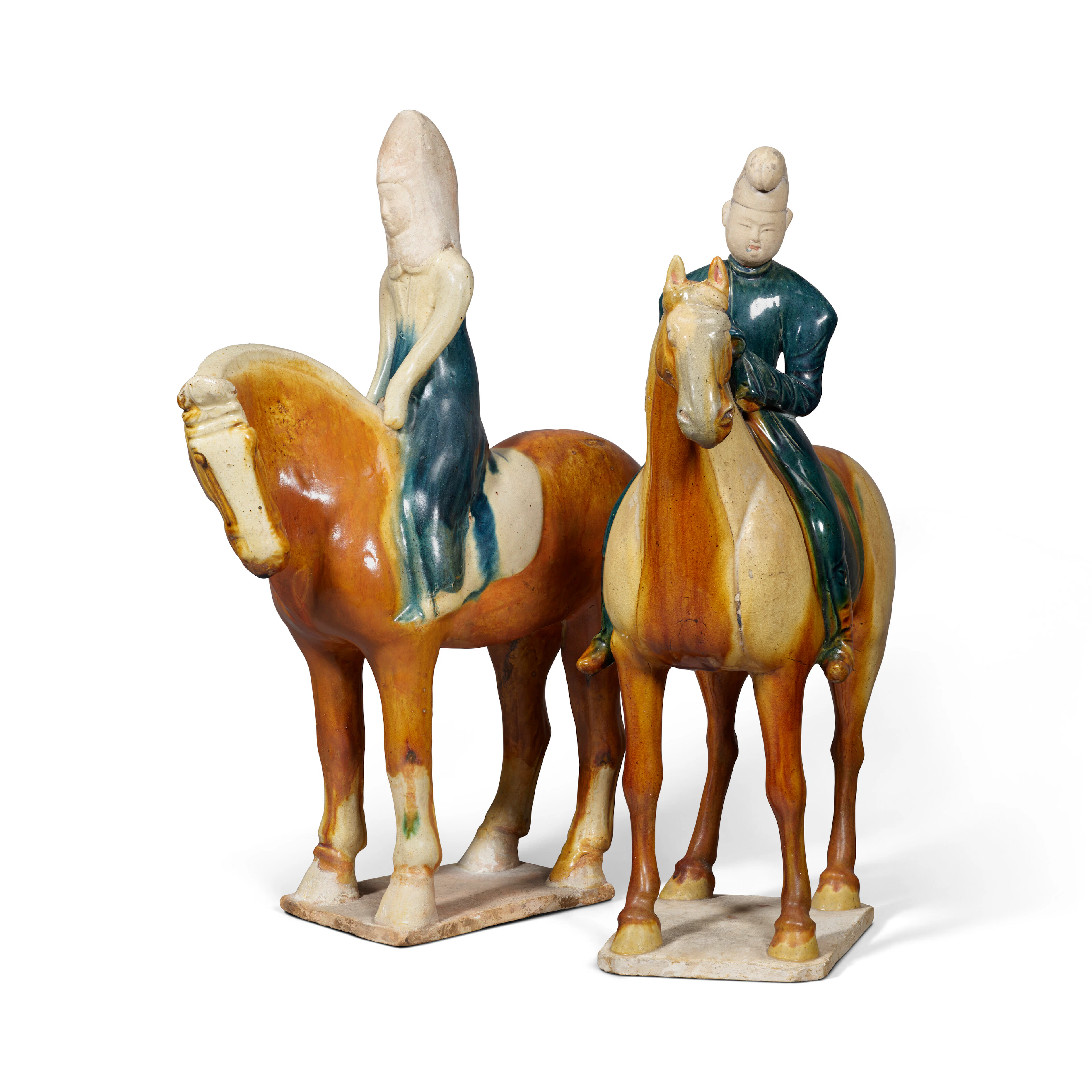 Two Rare Sancai and Blue-Glazed Figures of Equestrians