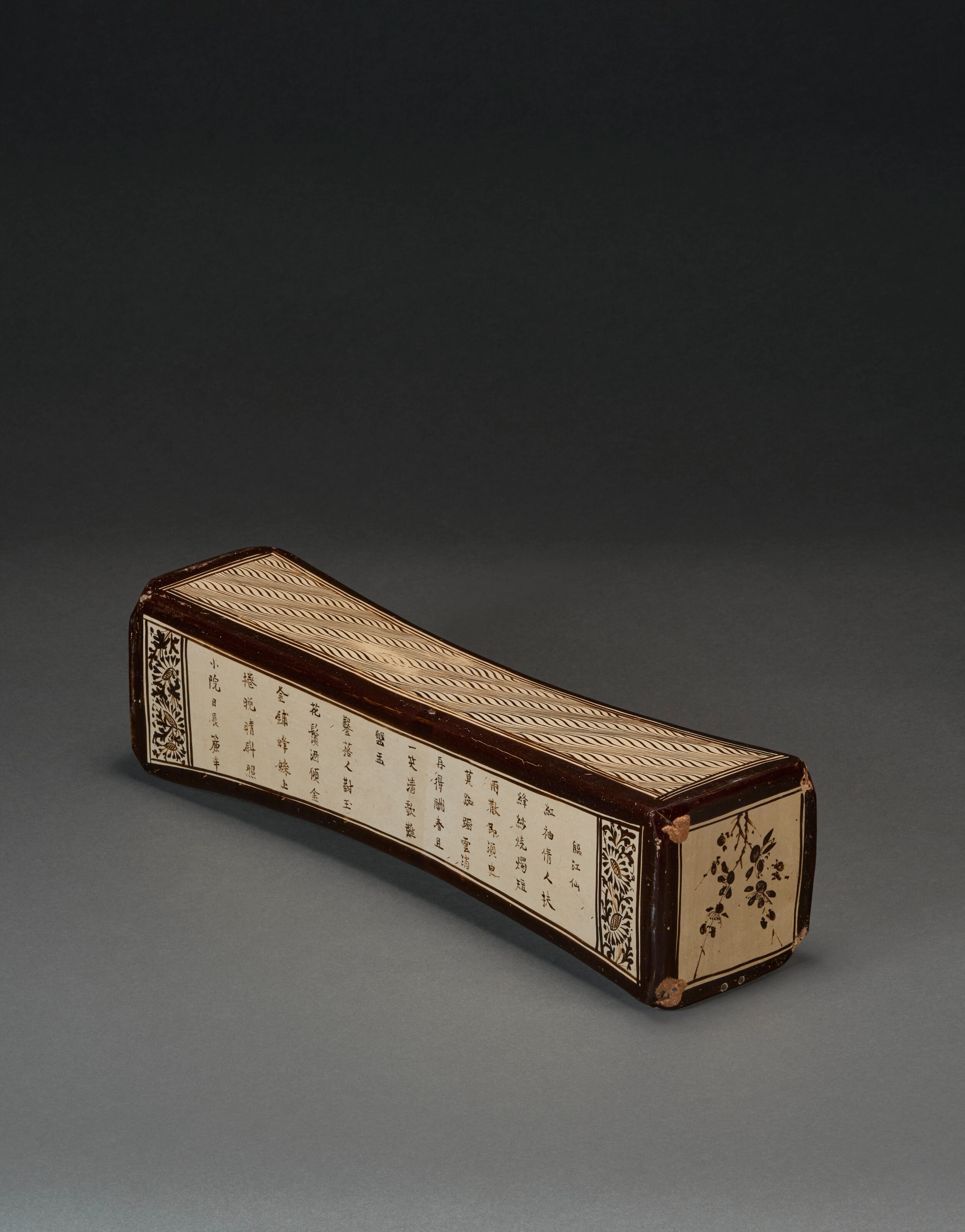 AN EXTREMELY RARE LARGE PAINTED AND INSCRIBED JIZHOU PILLOW