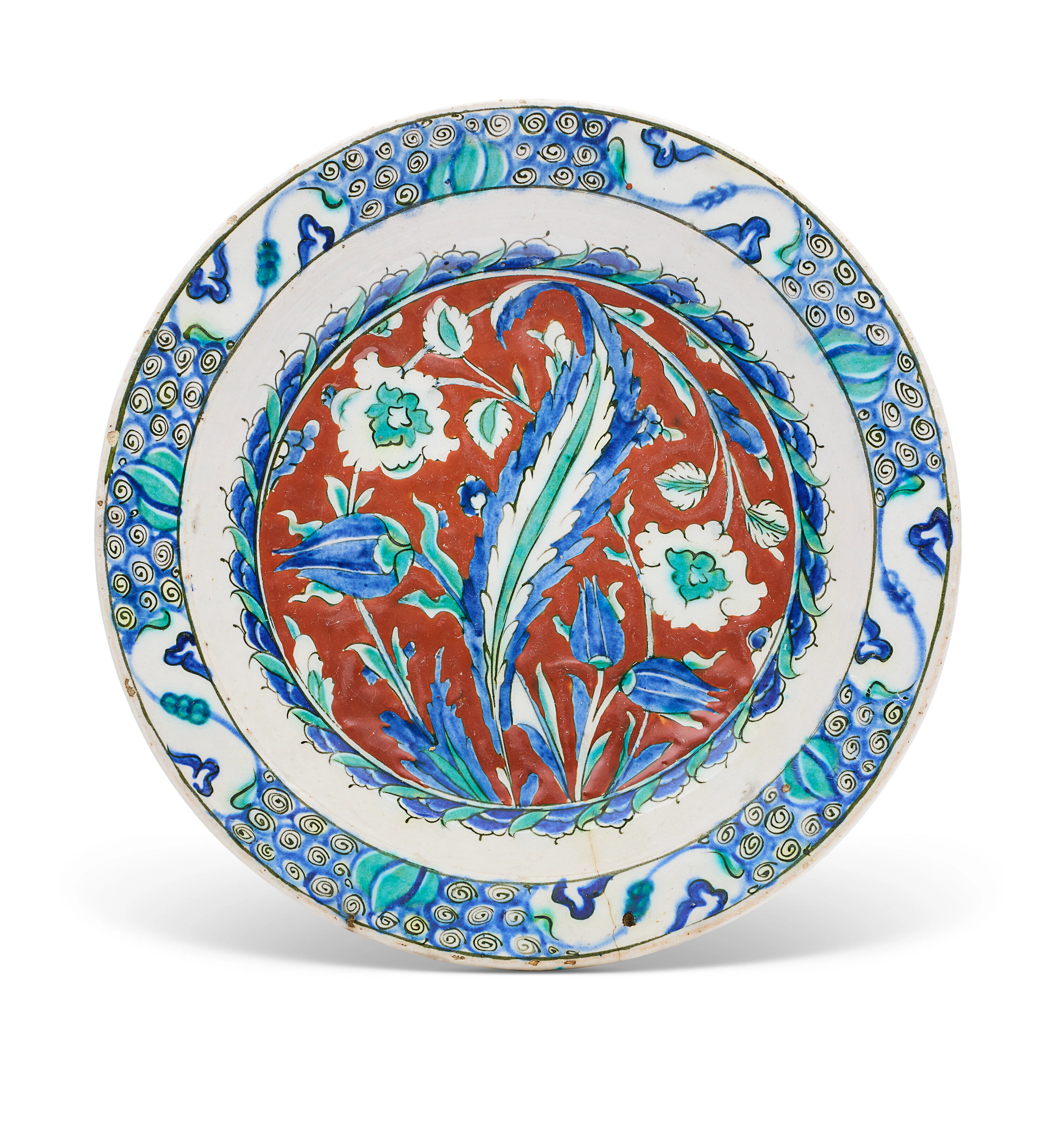 A LARGE IZNIK POTTERY DISH