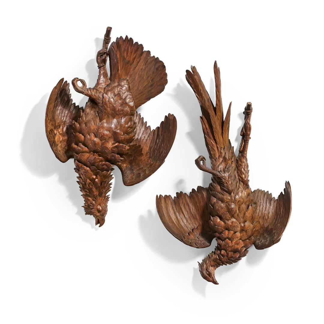 A Pair of 'Black Forest' Carved Hunting Trophies