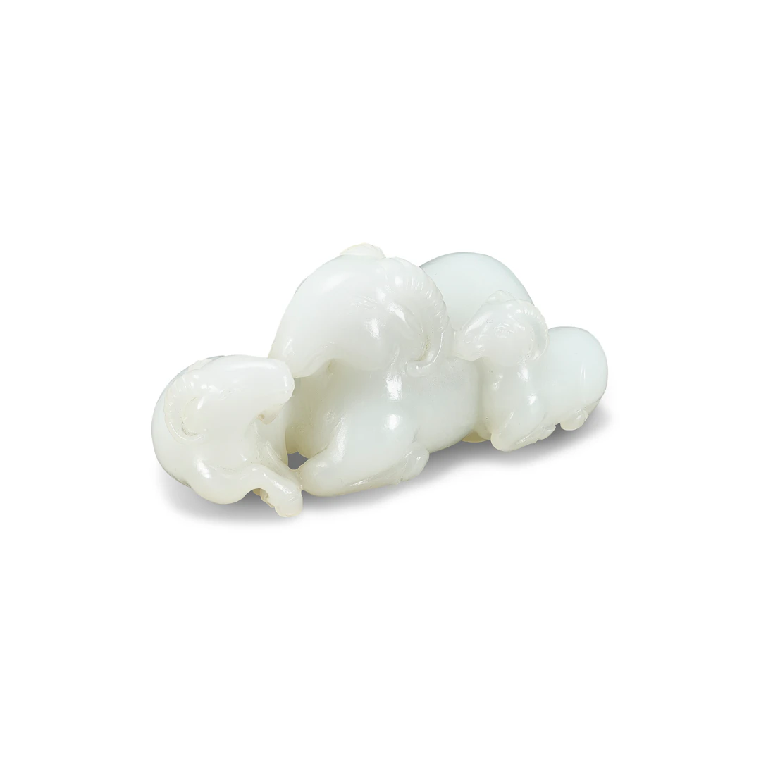 A Finely Carved White Jade ‘Three-Ram’ Group