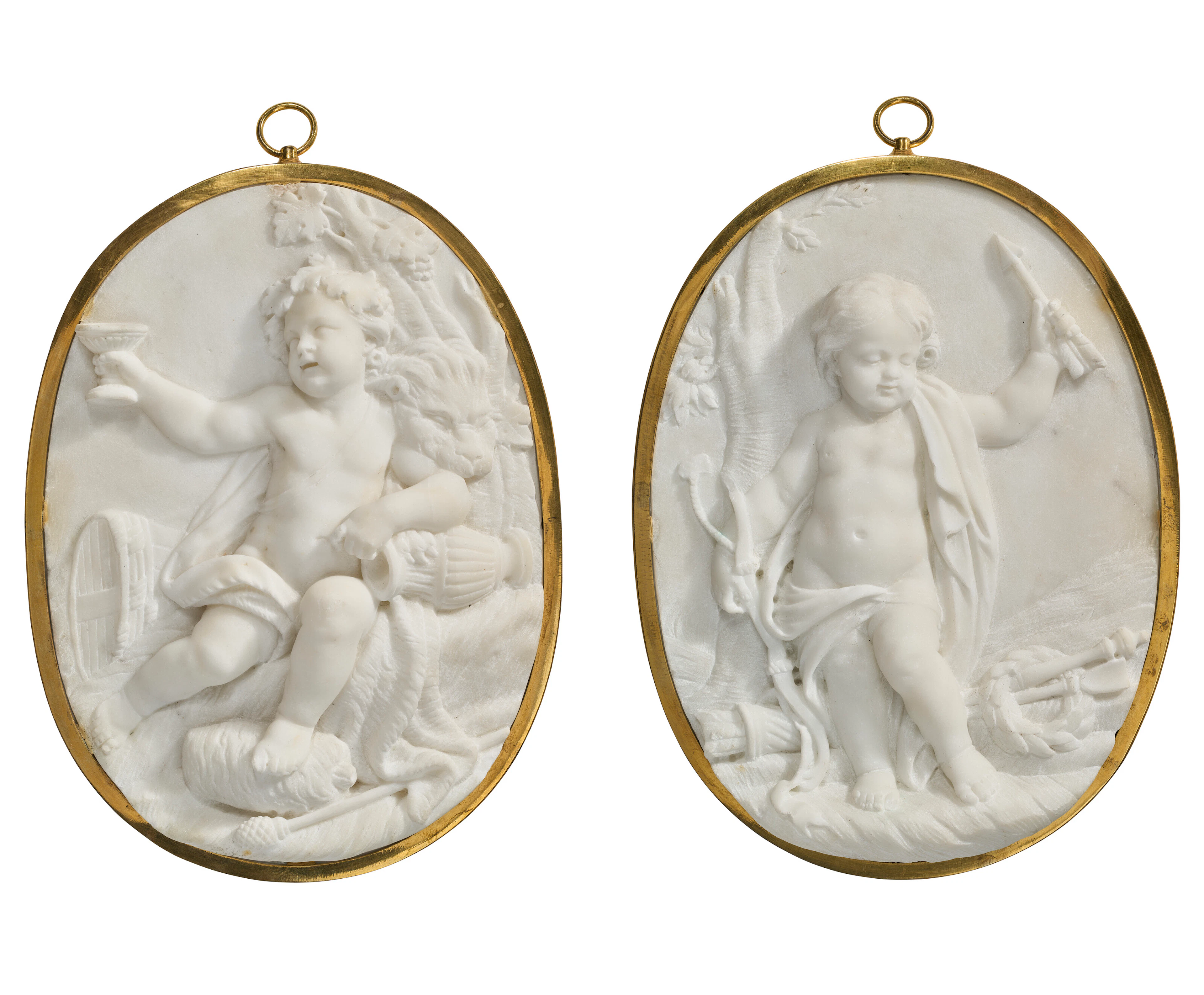 A Pair of French White Marble Medallions, One Depicting a Scene of