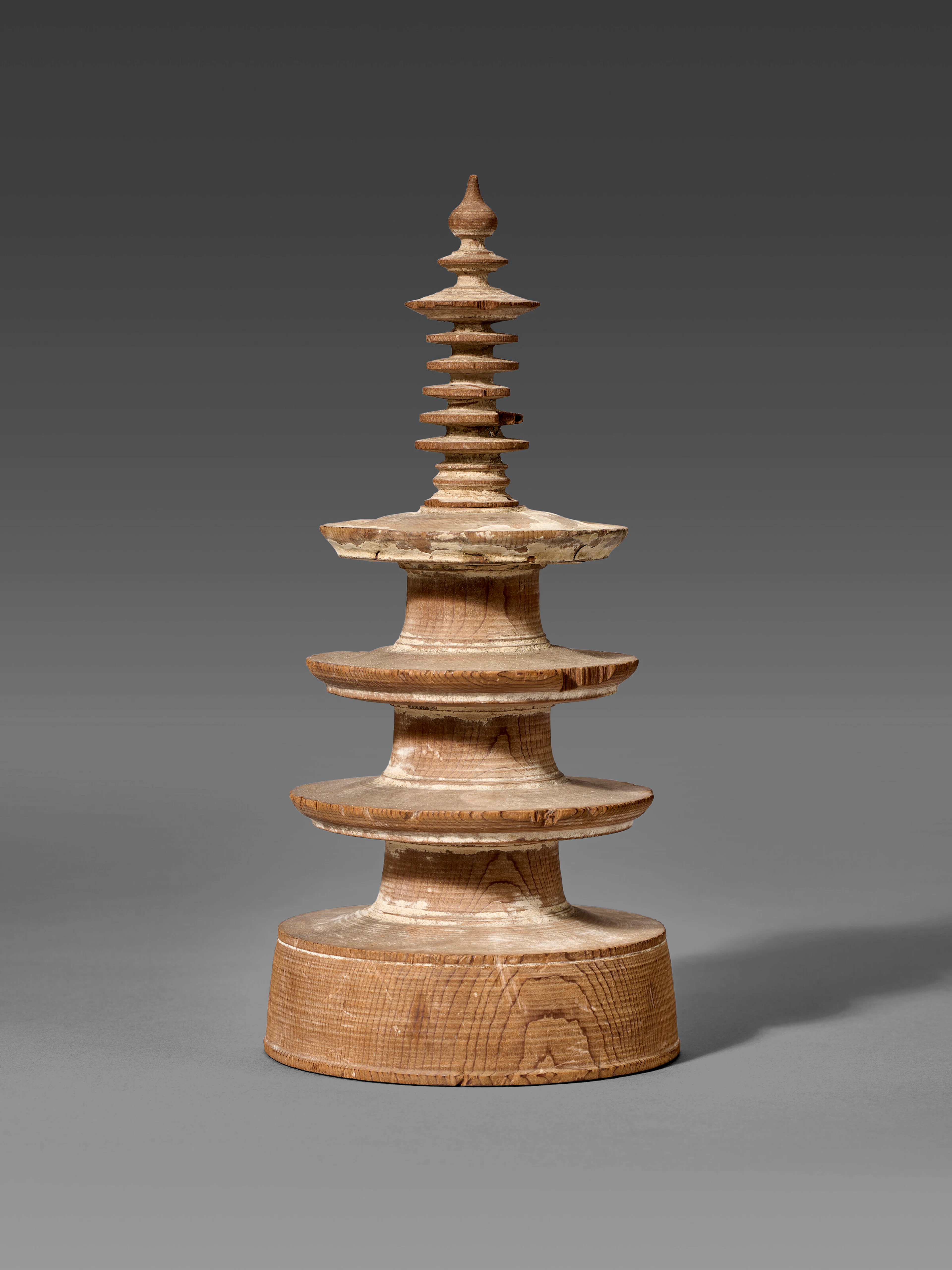 A WOOD PAGODA FROM THE SET OF 'ONE MILLION PAGODAS' ( HYAKUMANTO )