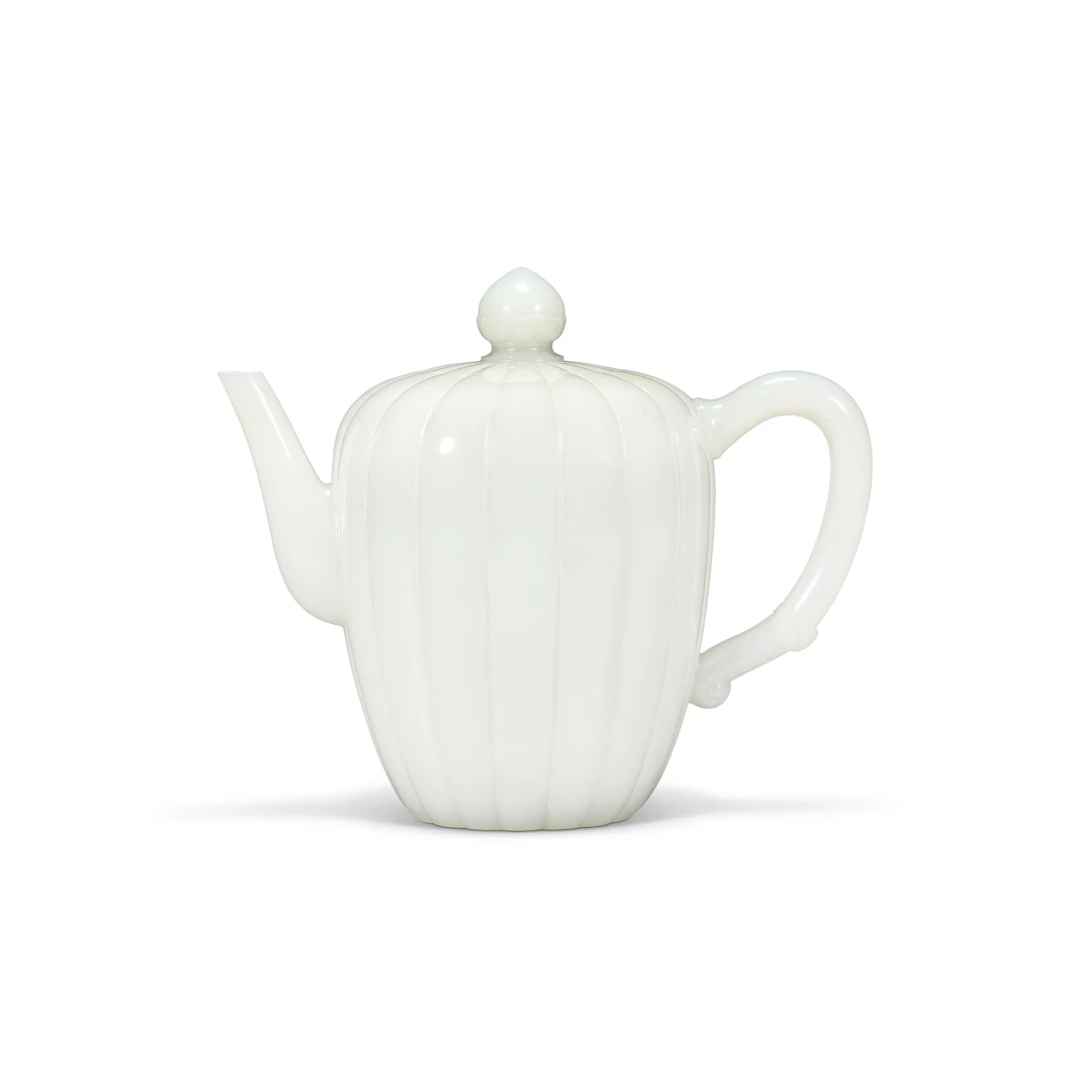 A Superb and Very Rare Imperial White Jade Lobed Teapot and Cover
