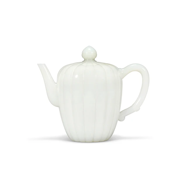 A Superb and Very Rare Imperial White Jade Lobed Teapot and Cover