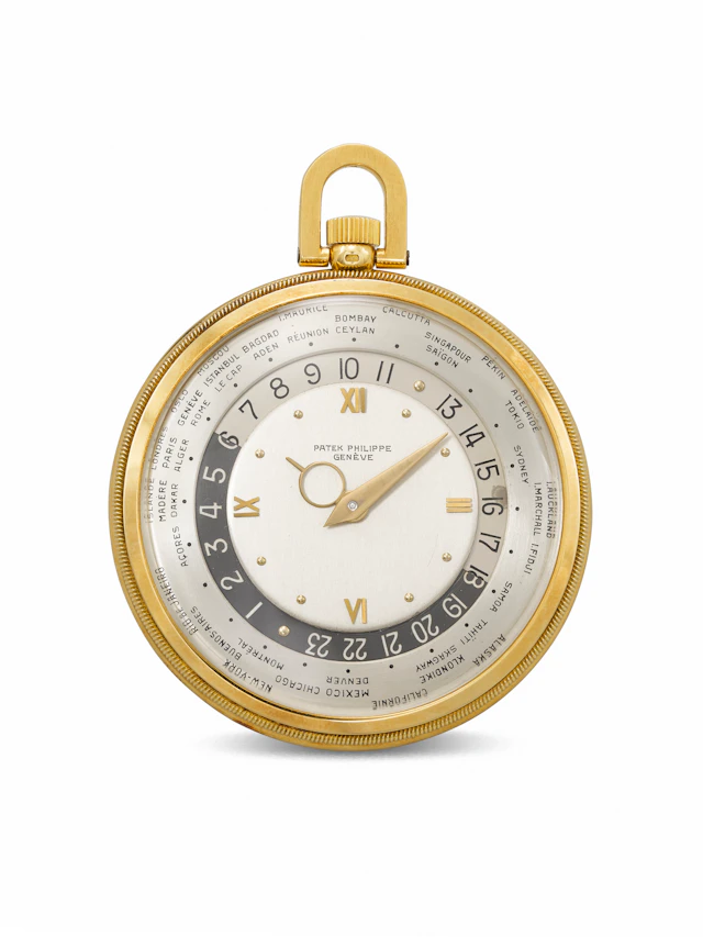 Patek Philippe. An Important 18K Gold Openface Keyless Lever World Time Watch