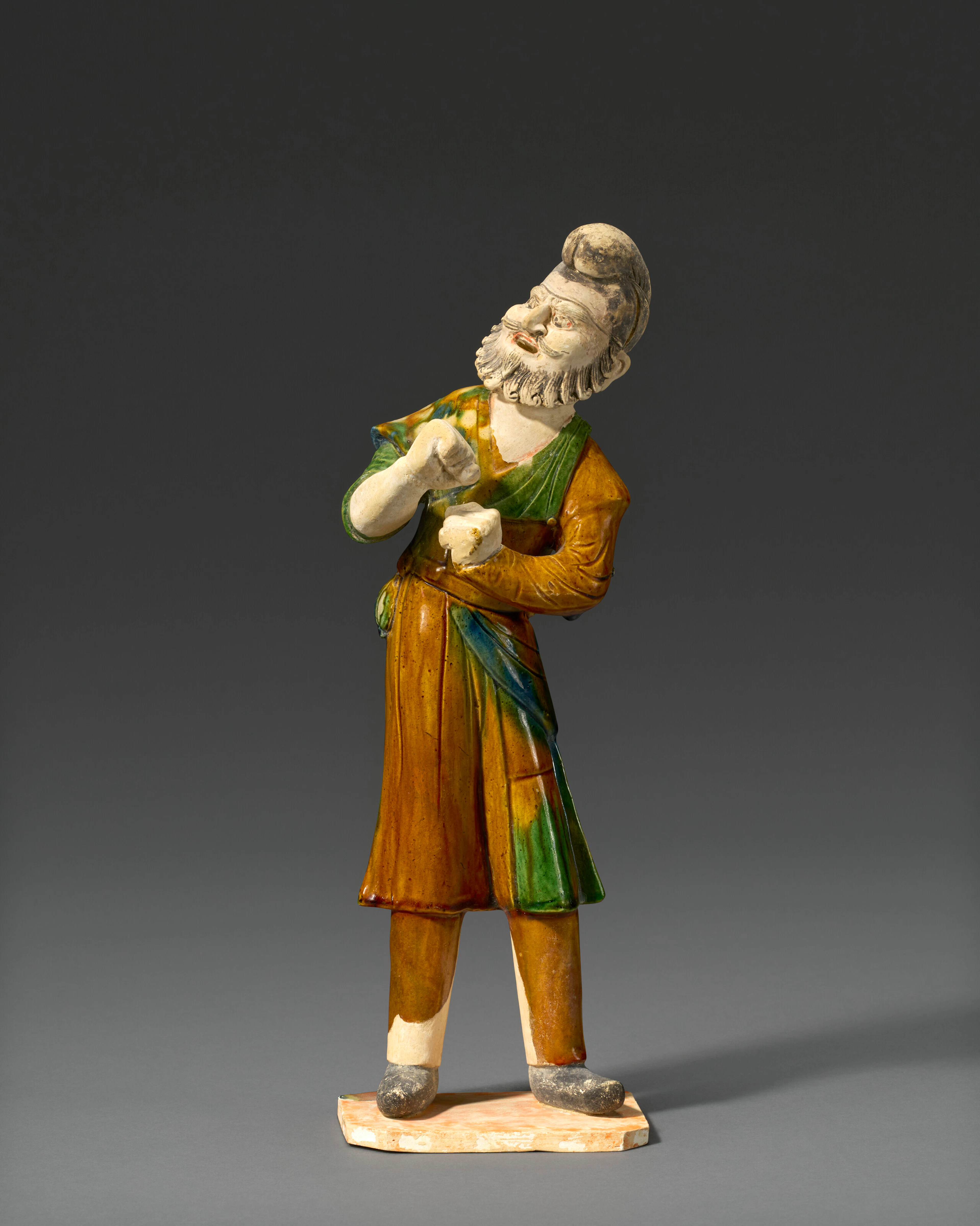 A Sancai -Glazed and Painted Pottery Figure of a Foreign Groom