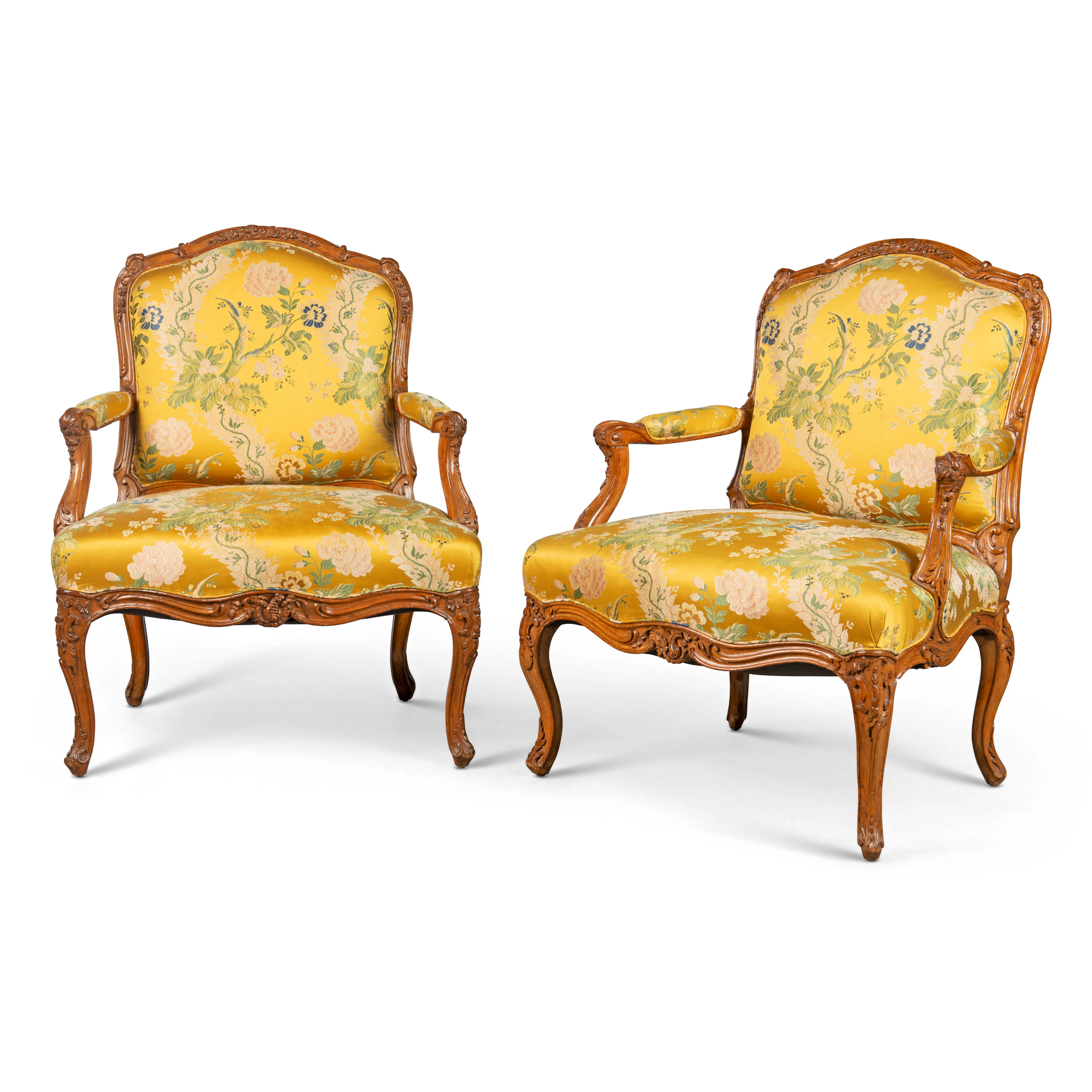 A Pair of Louis Xv Stained Beech Fauteuils À La Reine