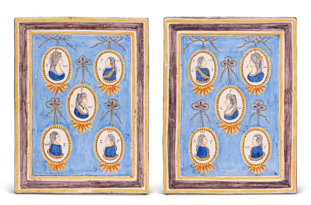 A Pair of Dutch Delft Polychrome Rectangular Portrait Plaques