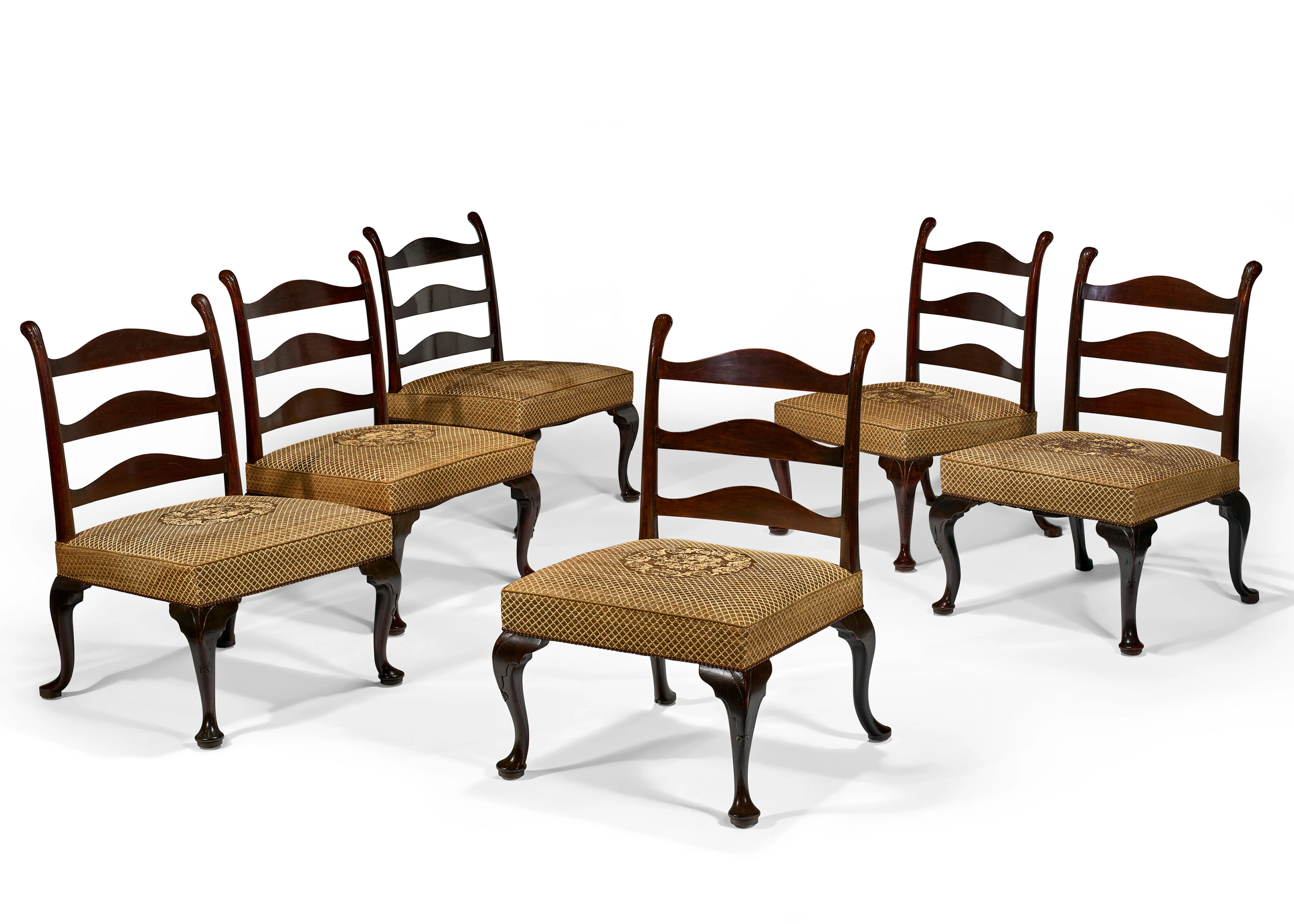 A Set of Six Large George Iii Stained Mahogany Ladder-Back Side Chairs