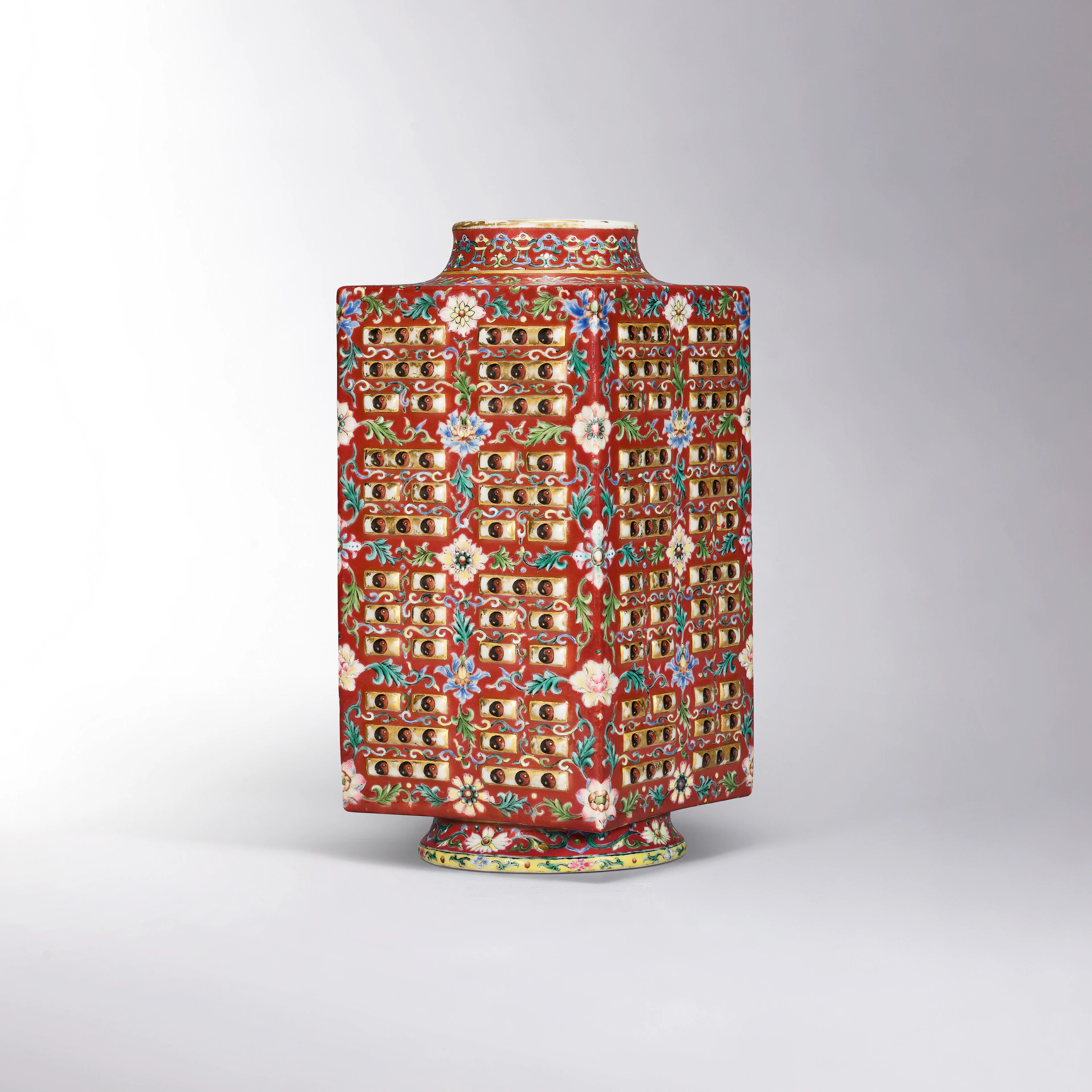 A VERY RARE RUBY-GROUND YANGCAI AND GILT-DECORATED ‘EIGHT TRIGRAMS