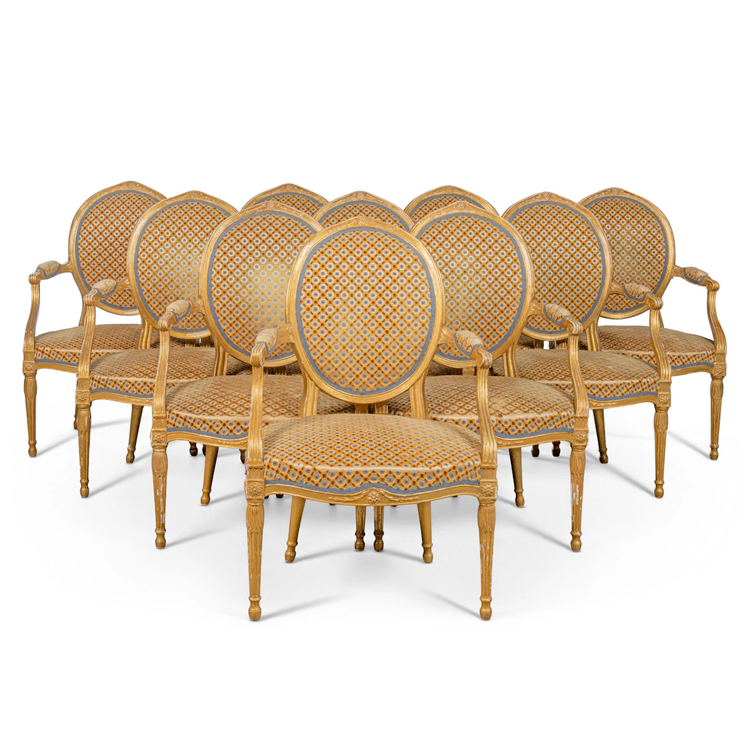 A Set of Ten George Iii Giltwood Armchairs