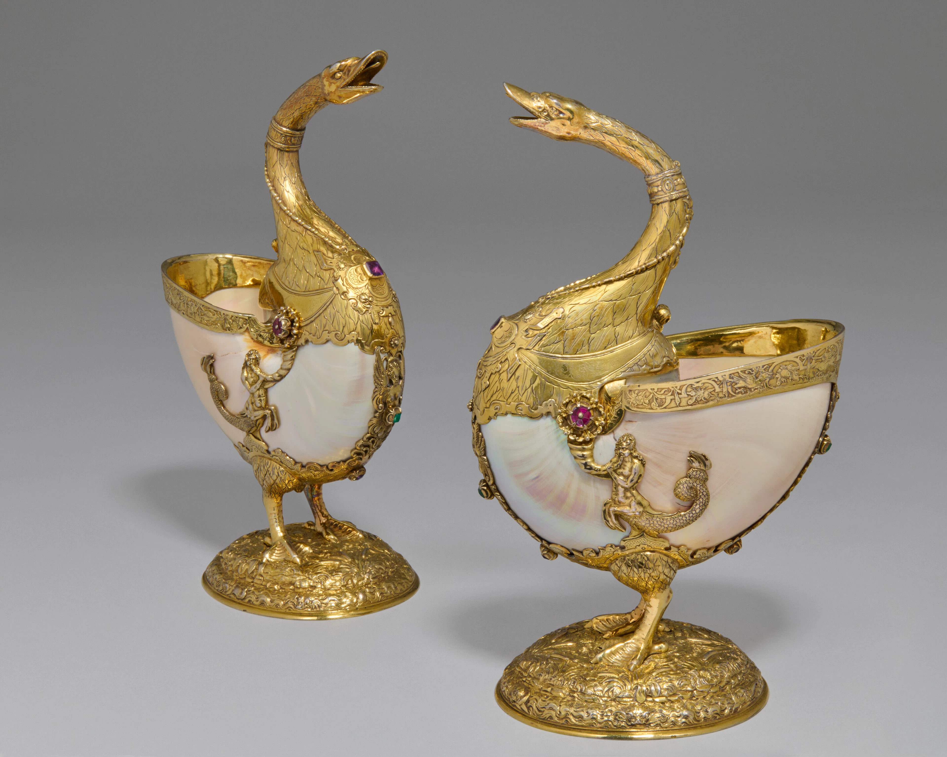 A Pair of German Jewelled Silver-Gilt Mounted Nautilus Cups