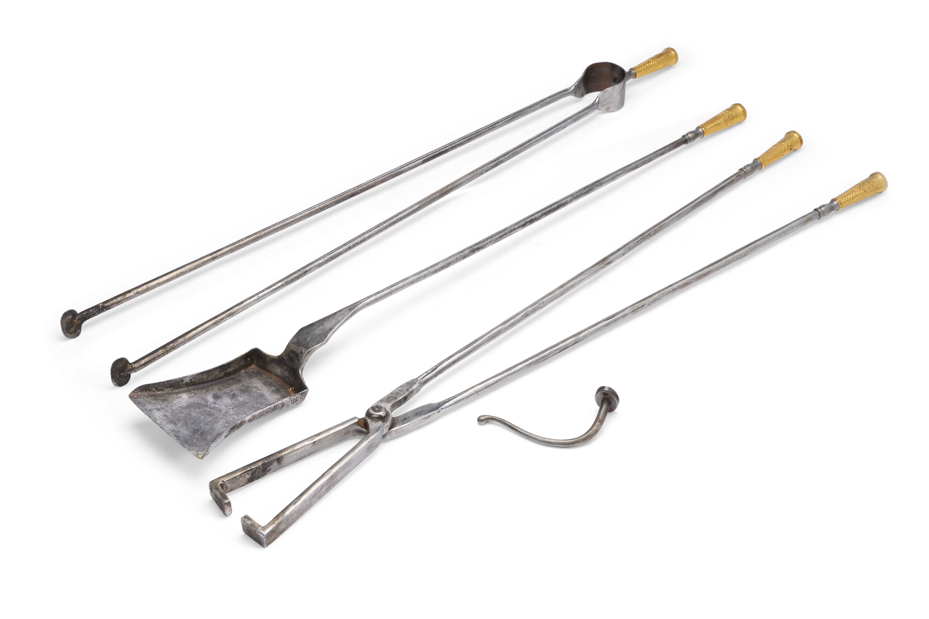 A Set of Three French Ormolu and Steel Firetools