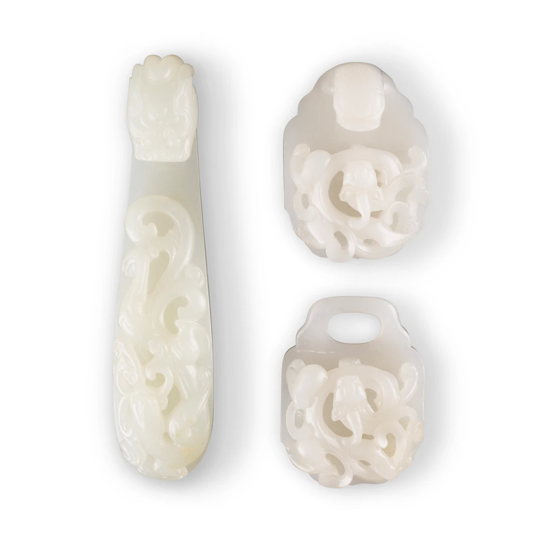 A Set of White Jade ' Chi Dragon ' Belt Hook and Buckle, and a White