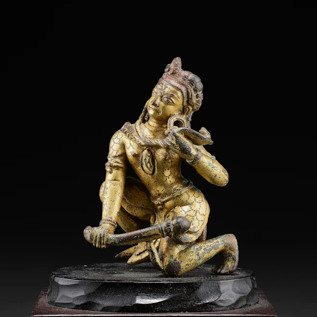 A Gilt Copper Alloy Figure of a Demon Victim of Durga's Wrath