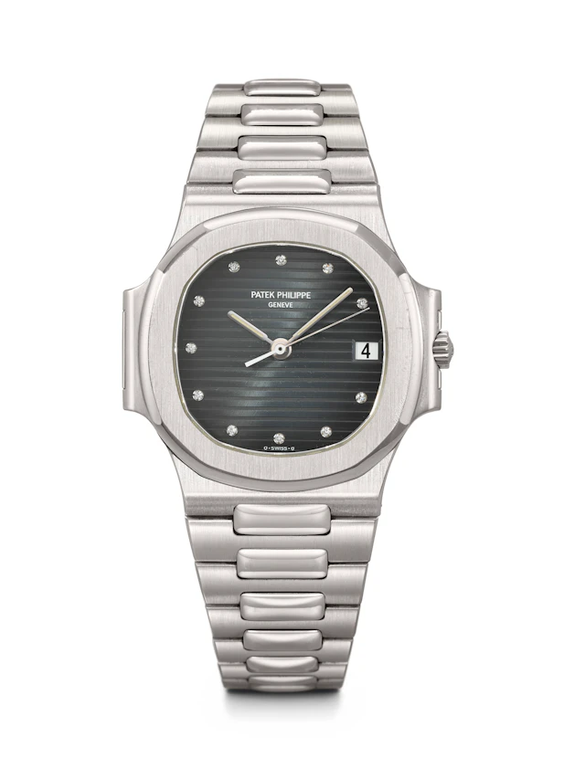 Patek Philippe. A Rare and Attractive Stainless Steel and Diamond-Set