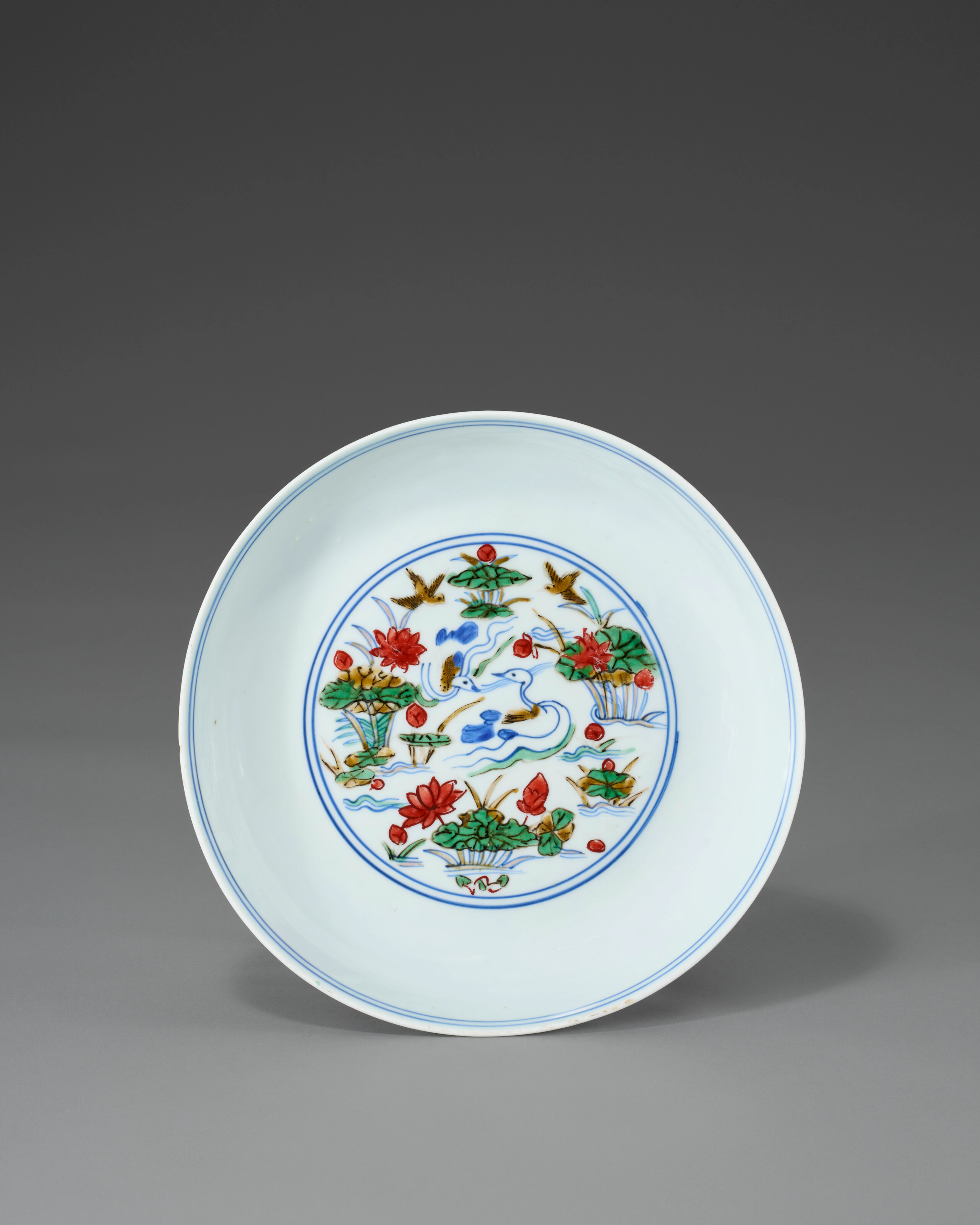 A Rare Wucai 'Duck and Lotus Pond' Dish