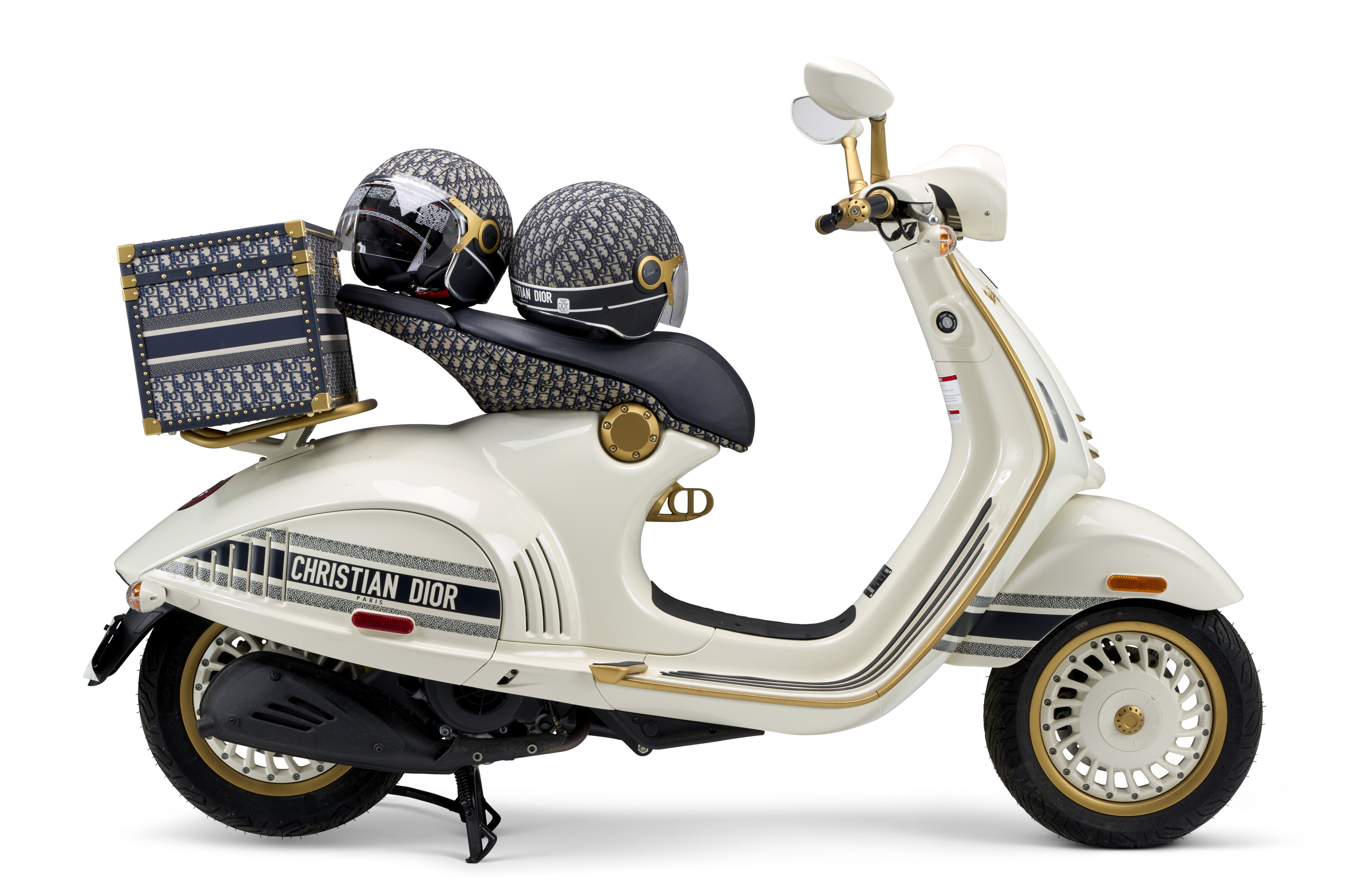 A Creme, Gold, Navy Oblique Jaquard Vespa 946 with Two Oblique Helmets & Trunk