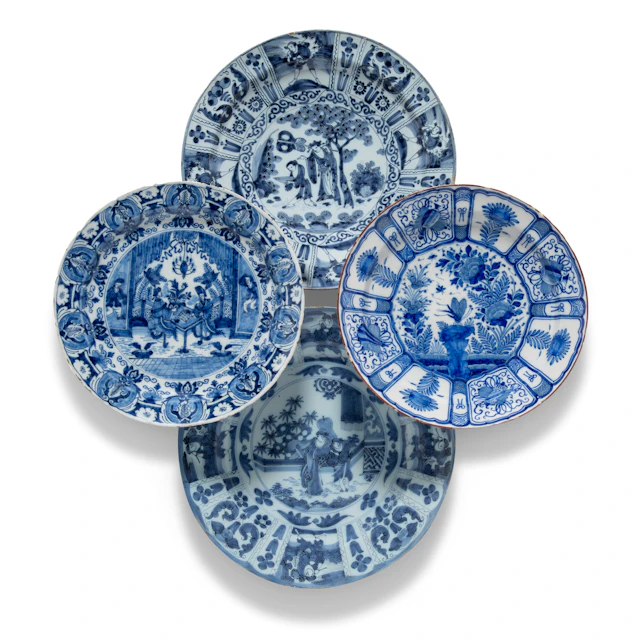 Four Dutch Delft Blue and White Chargers