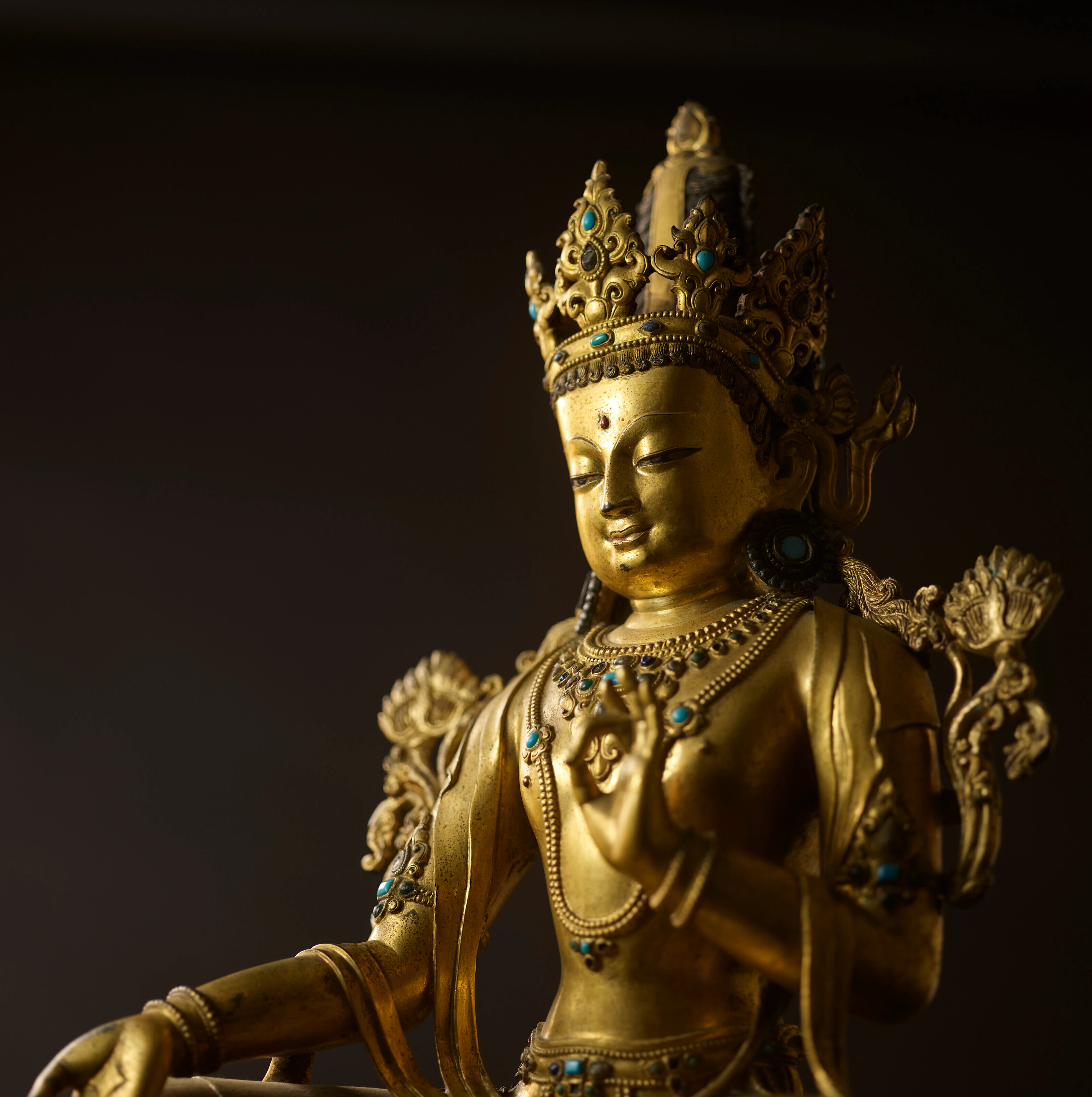 AN IMPERIAL GILT COPPER ALLOY FIGURE OF AVALOKITESHVARA