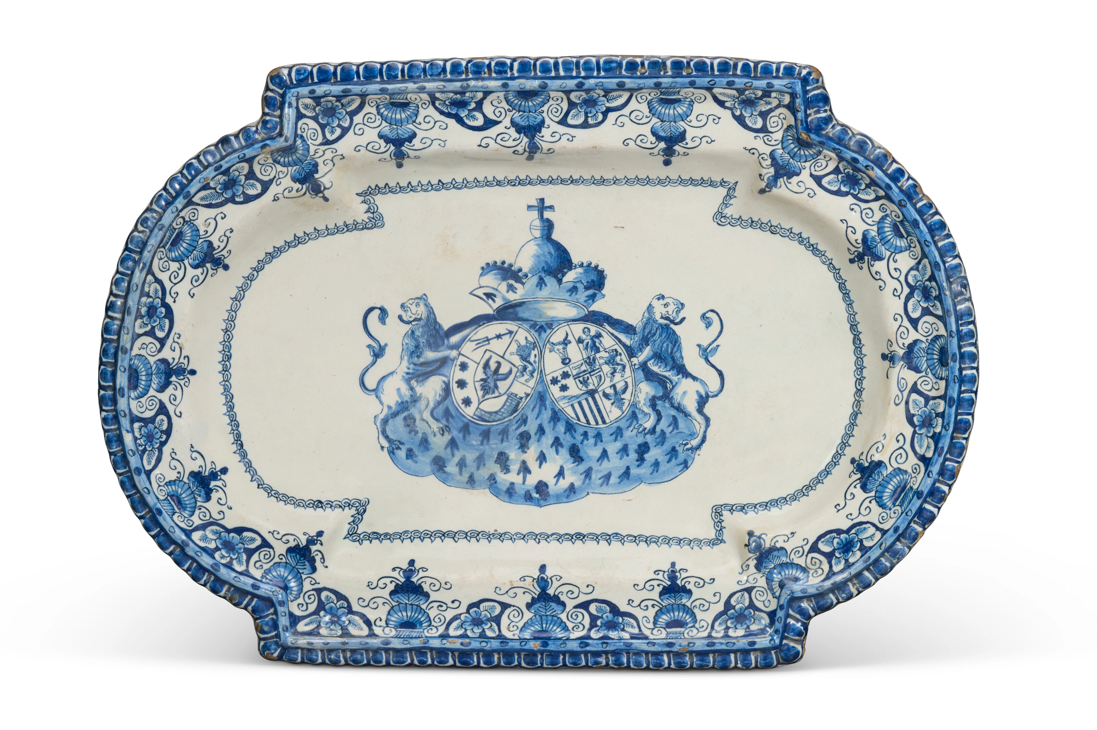 A Dutch Delft Blue and White Armorial Shaped Platter