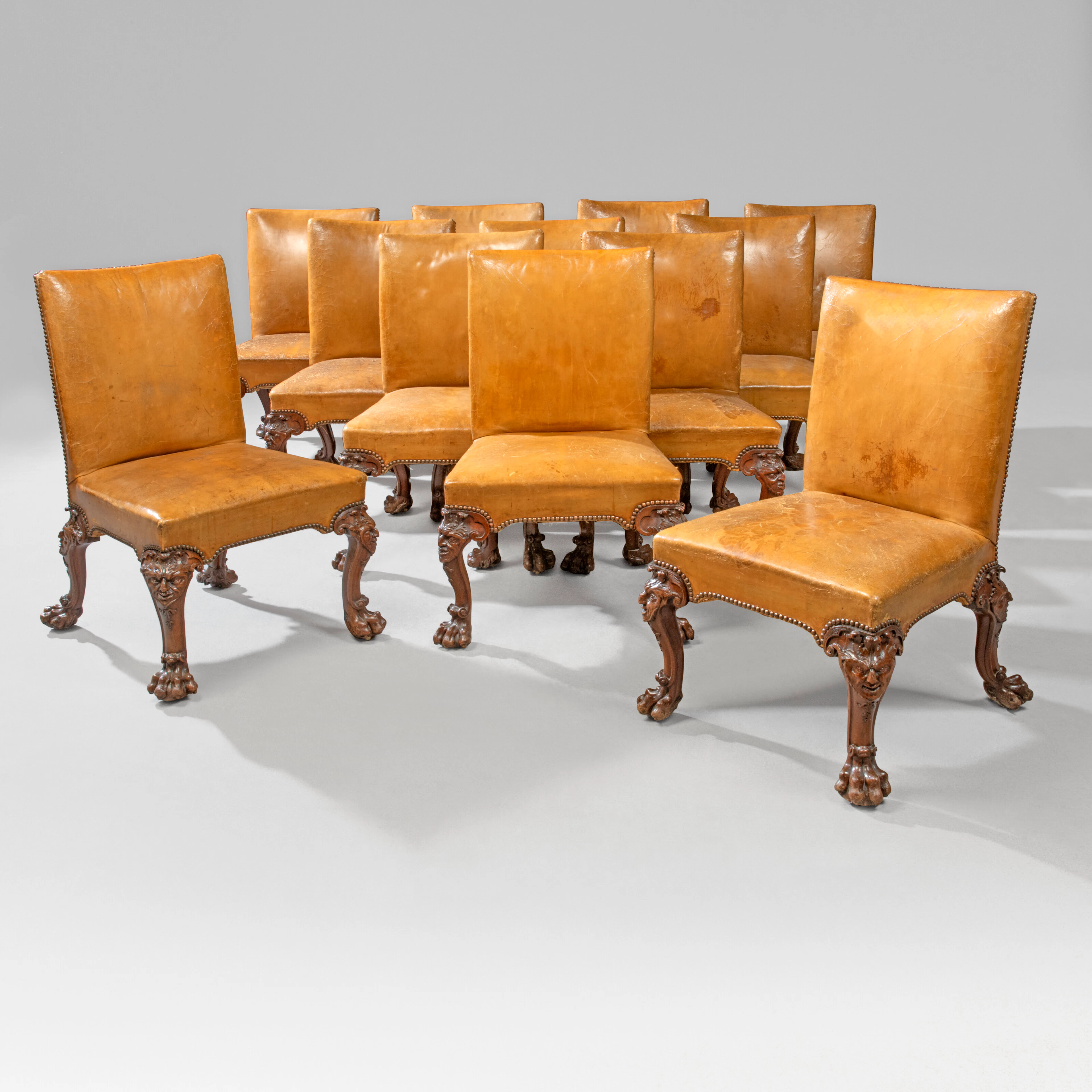 A Set of Twelve George Ii Walnut Side Chairs