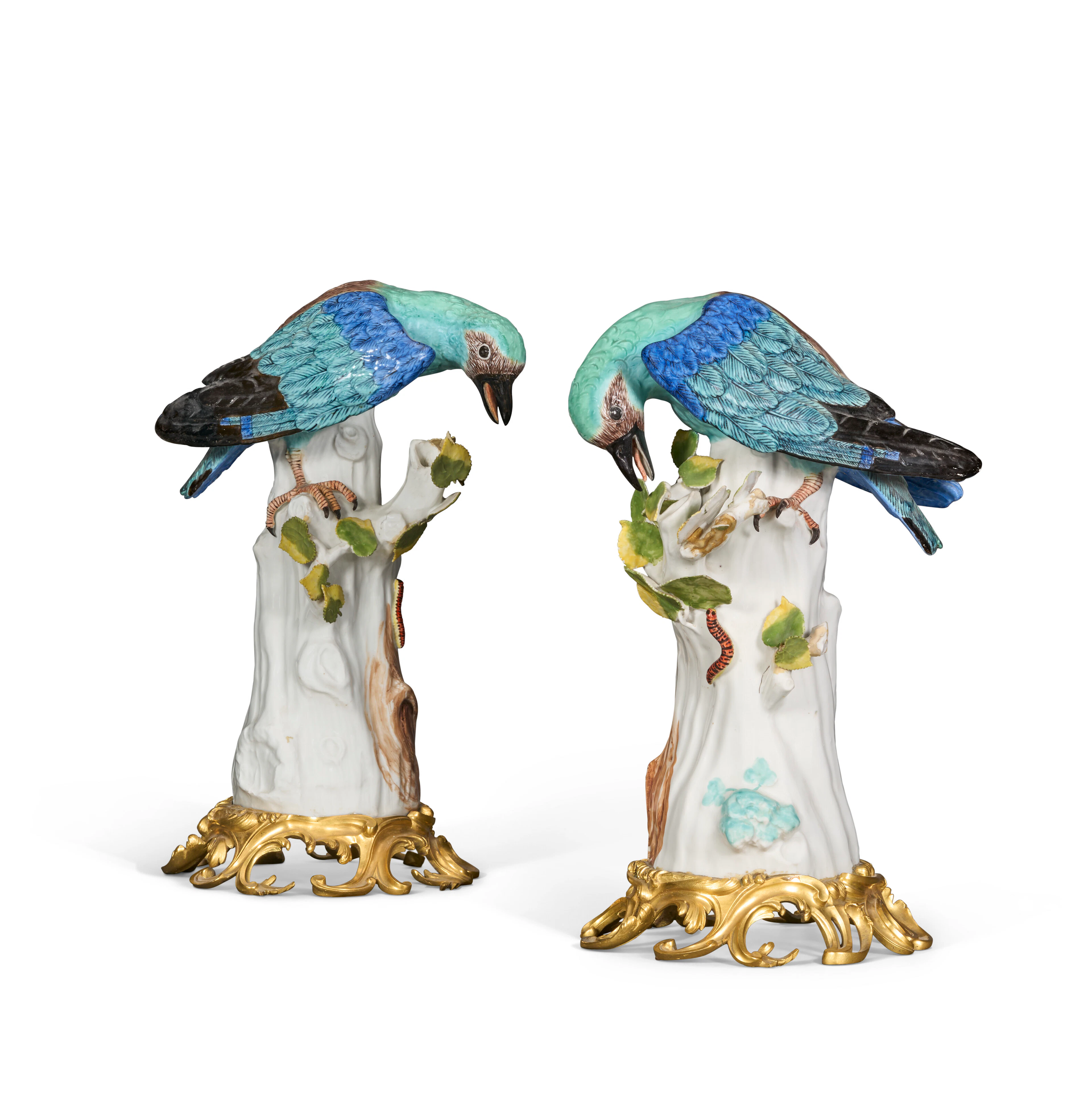 A PAIR OF LOUIS XV ORMOLU-MOUNTED MEISSEN PORCELAIN MODELS OF ROLLERS