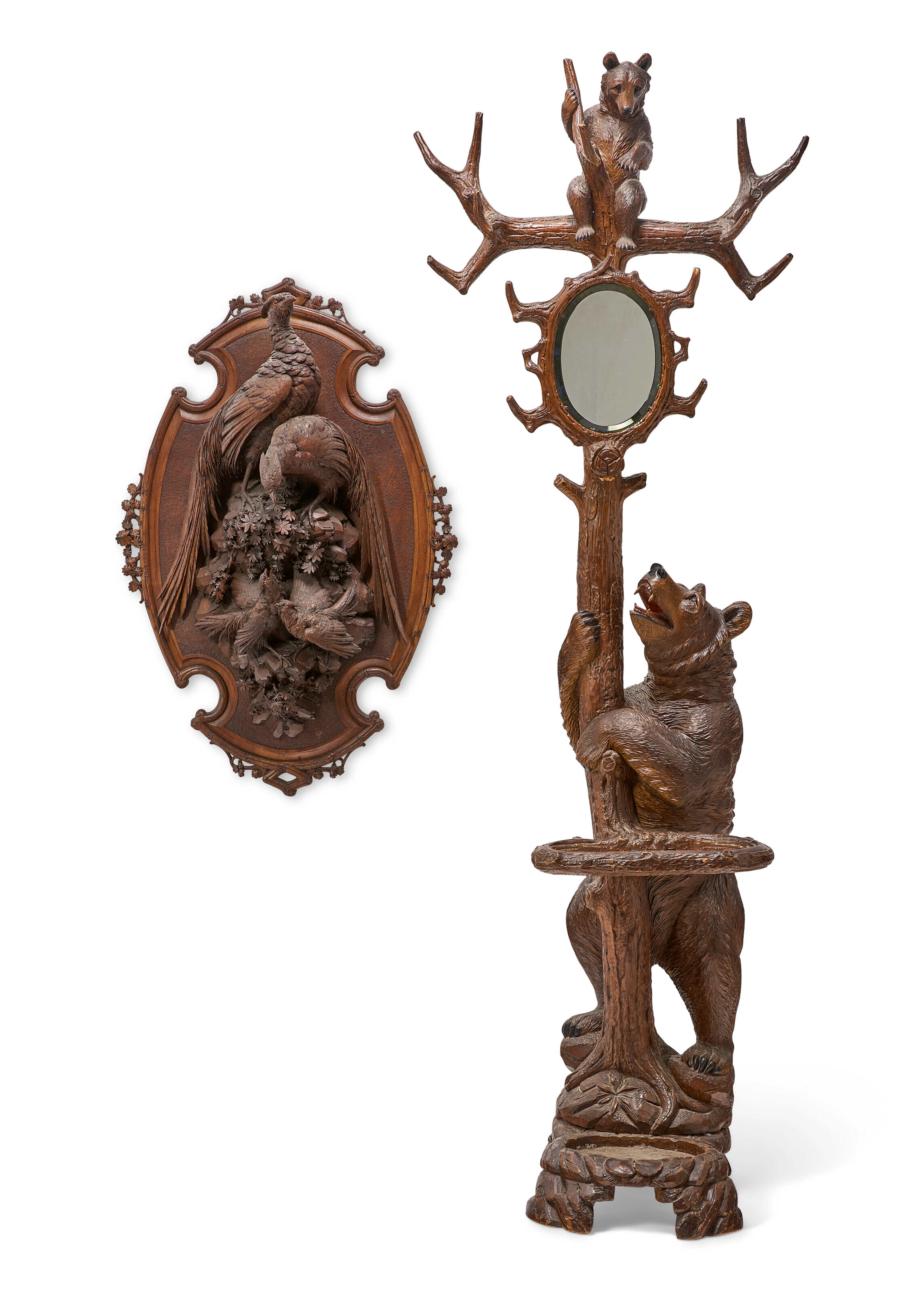 A Swiss Carved 'Black Forest' Figural Hallstand and