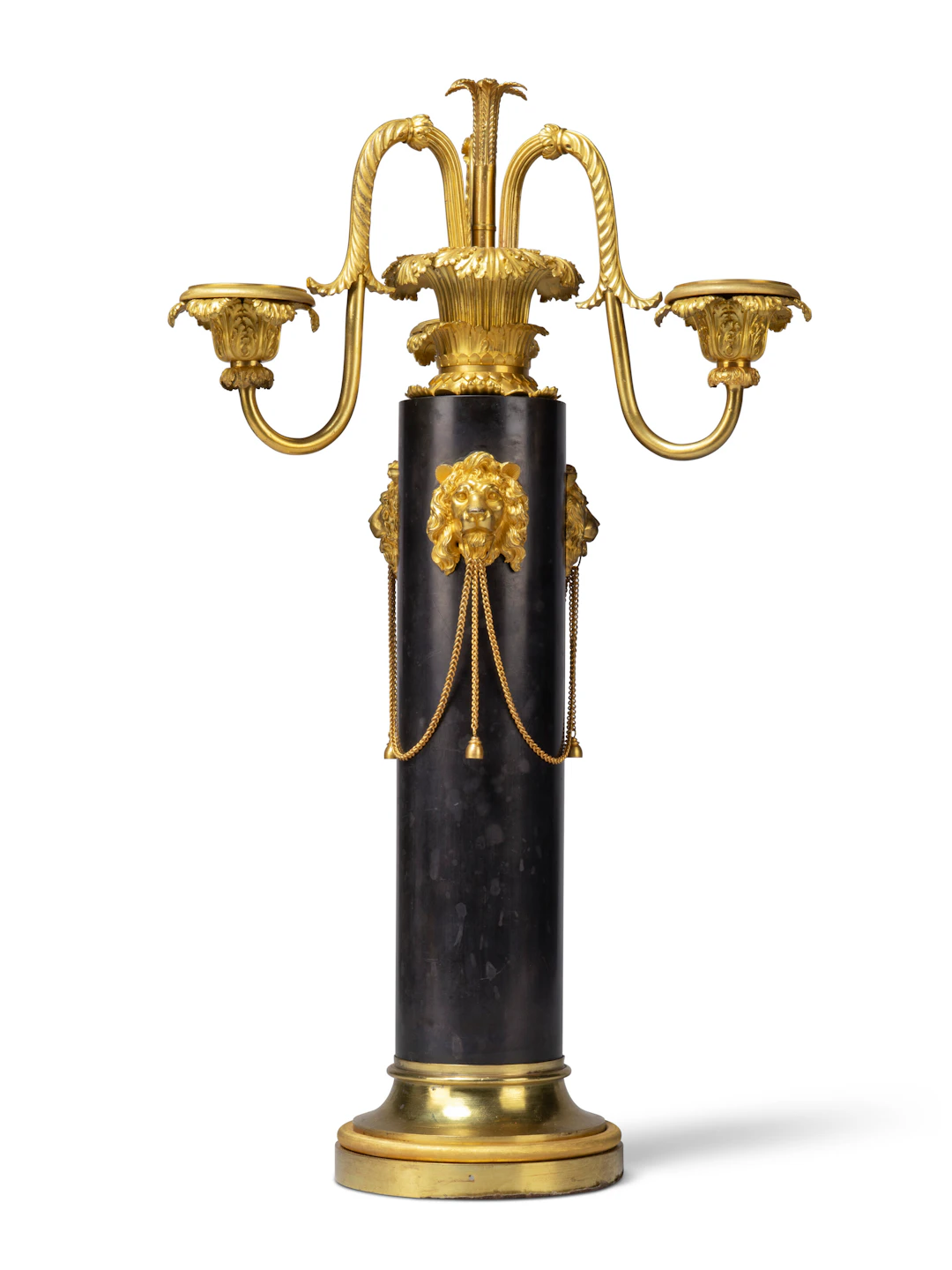 A Regency Brass and Black Slate Three-Light Candelabrum