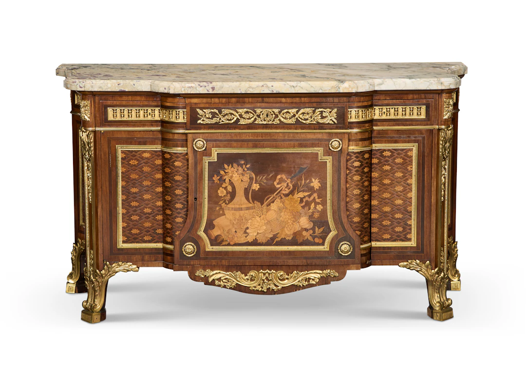 A French Ormolu-Mounted Mahogany, Tulipwood, Marquetry and Parquetry Commode