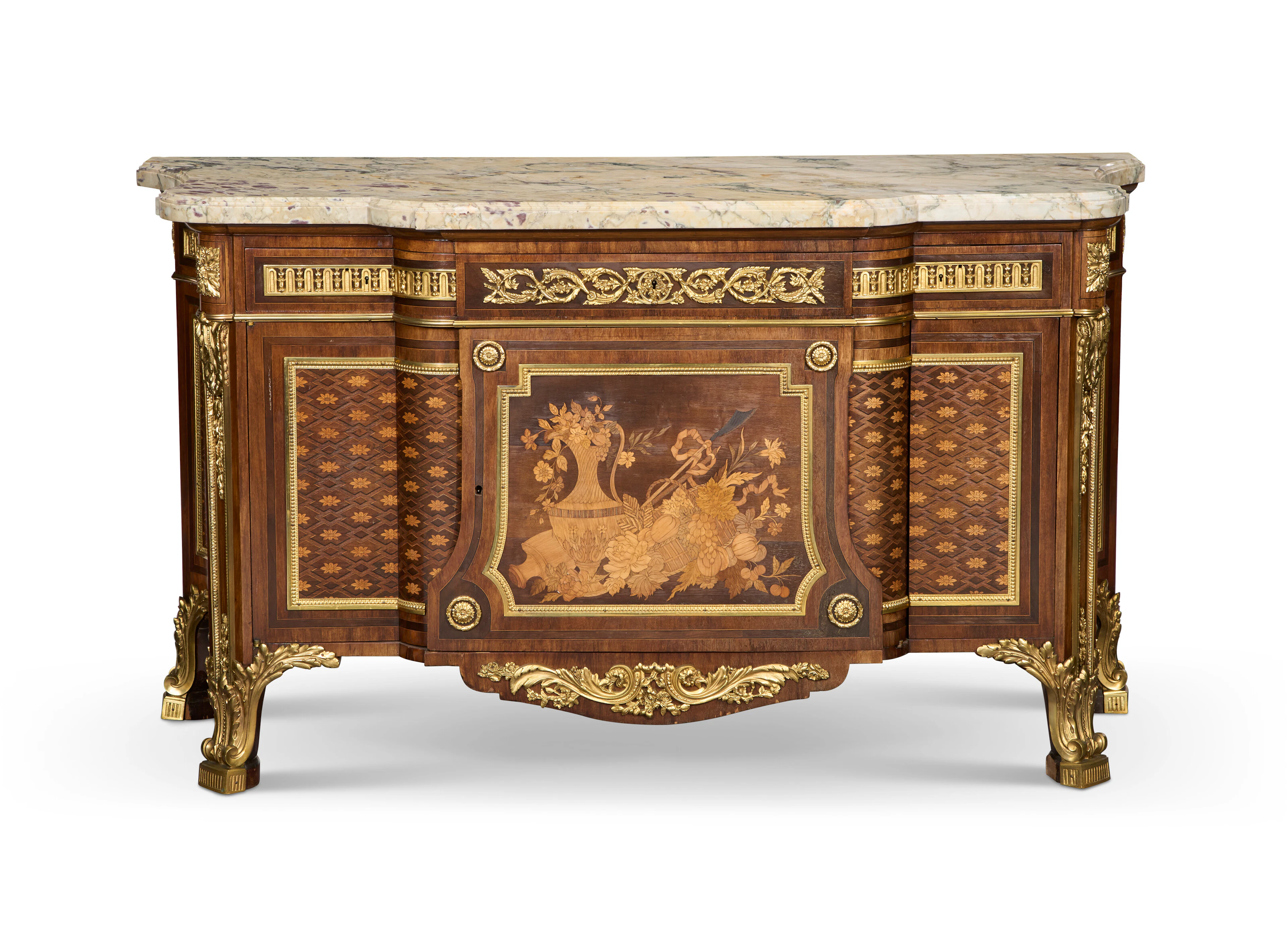 A French Ormolu-Mounted Mahogany, Tulipwood, Marquetry and Parquetry Commode