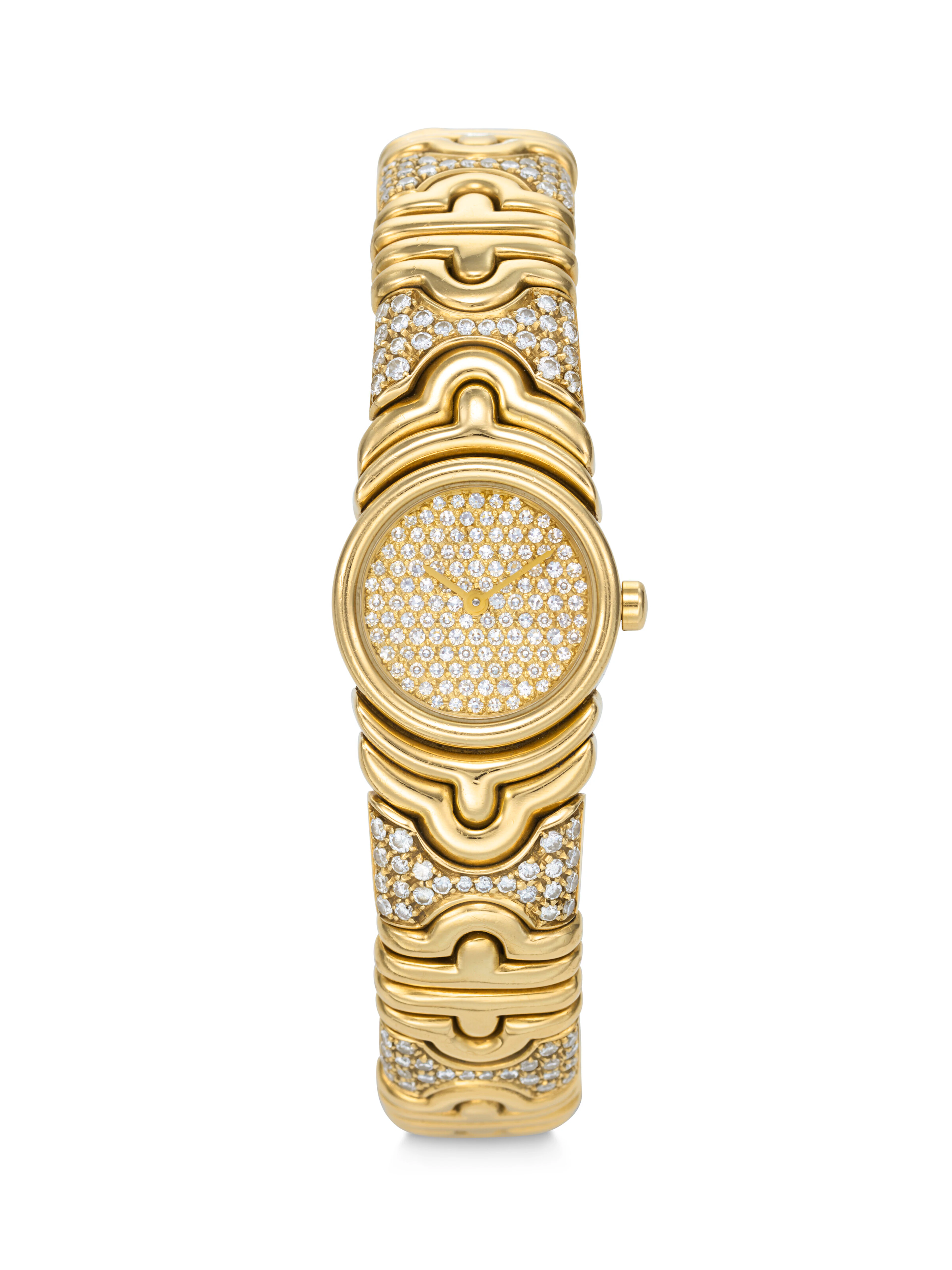 BULGARI. A VERY RARE AND OPULENT 18K GOLD AND DIAMOND-SET QUARTZ CUFF