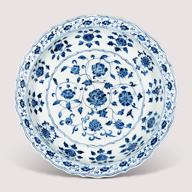 A Fine Large Blue and White ‘Floral Scroll’ Barbed-Rim Dish