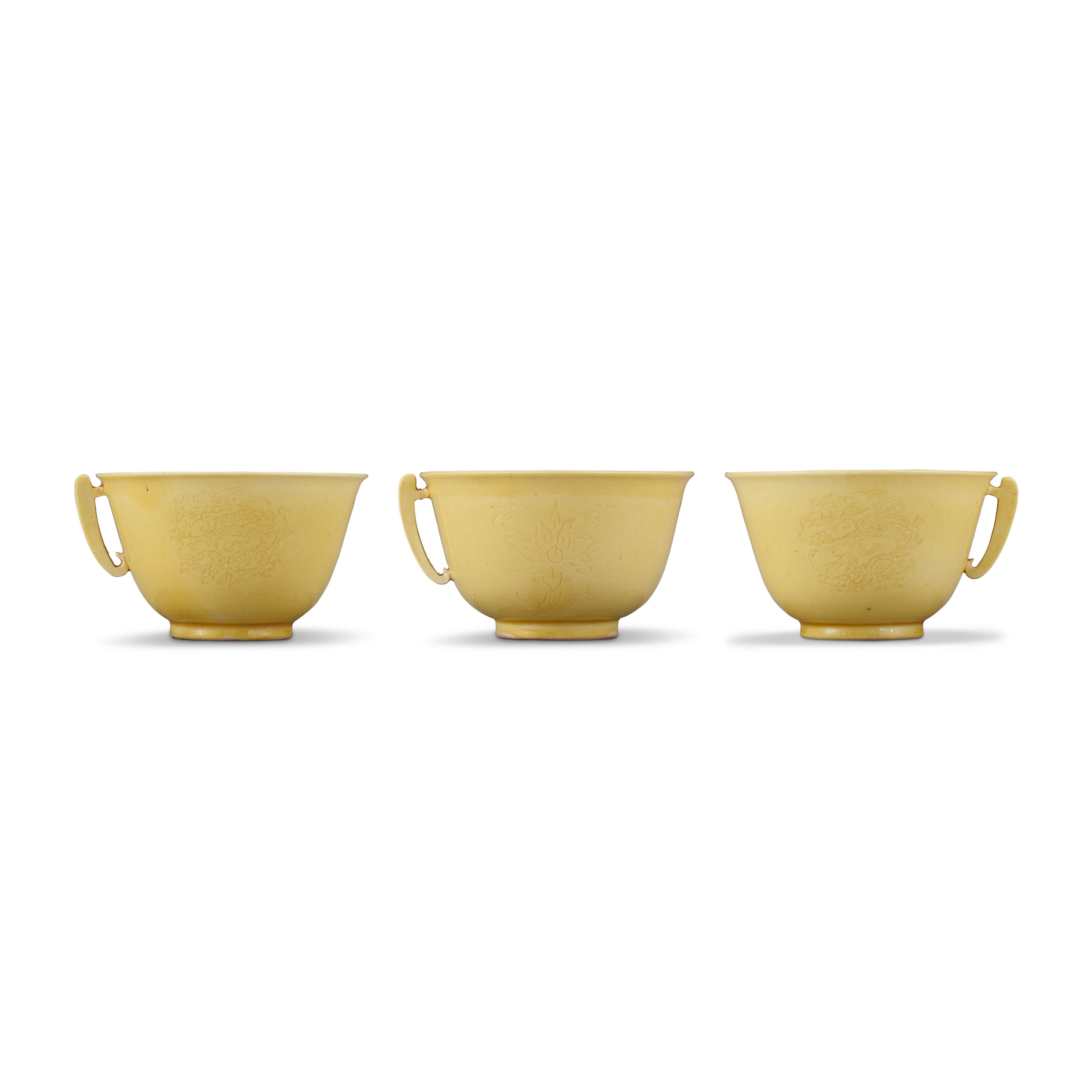 Three Small Incised Yellow-Enamelled Cups