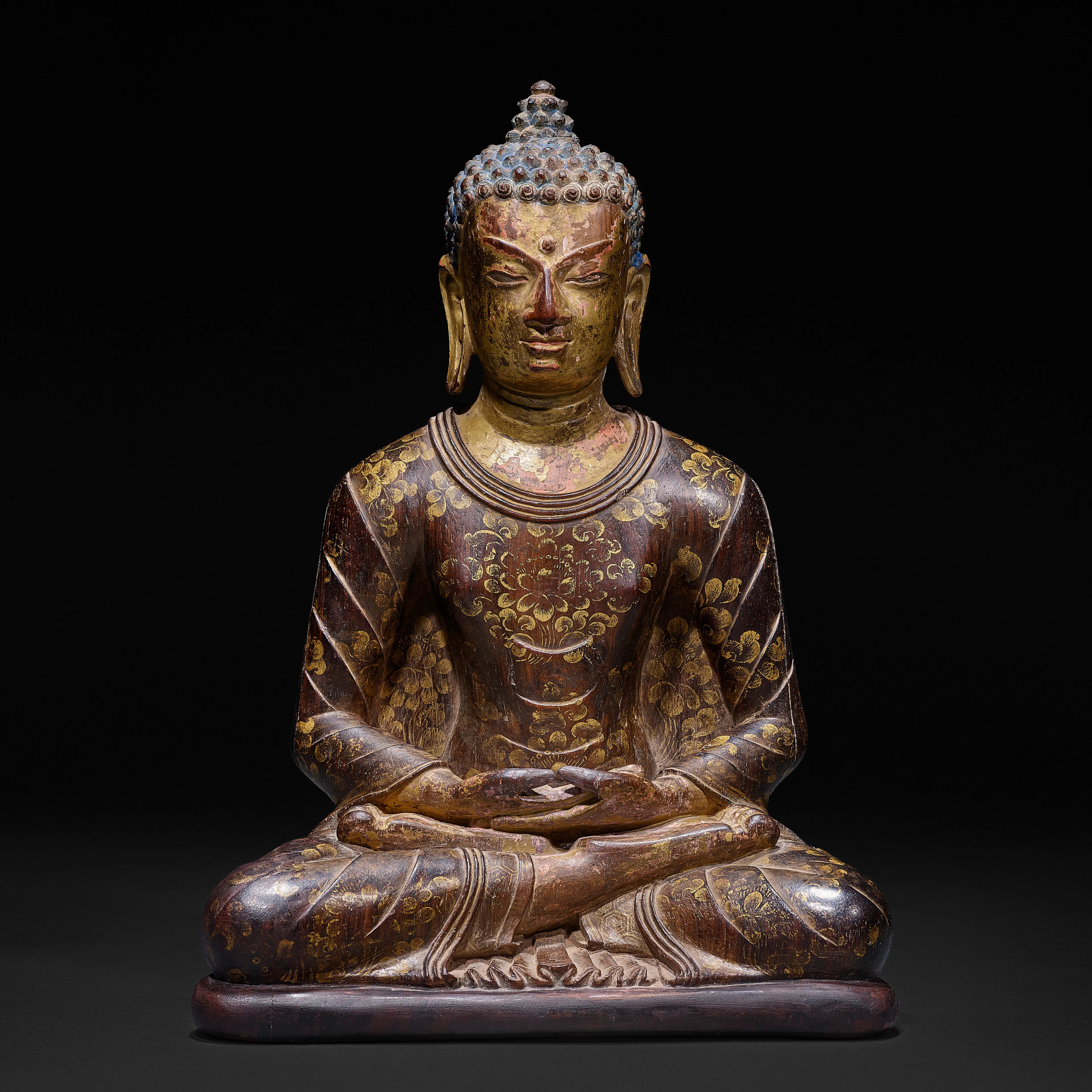 A Gilt Polychromed Zitan Figure of a Confession Buddha