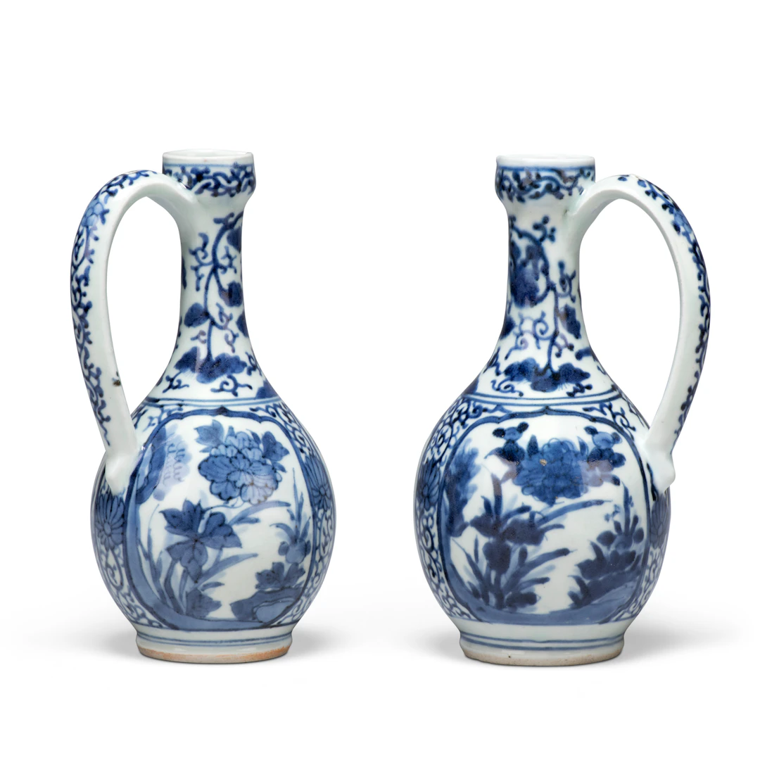 A Pair of Japanese Blue-And-White Arita Porcelain Ewers