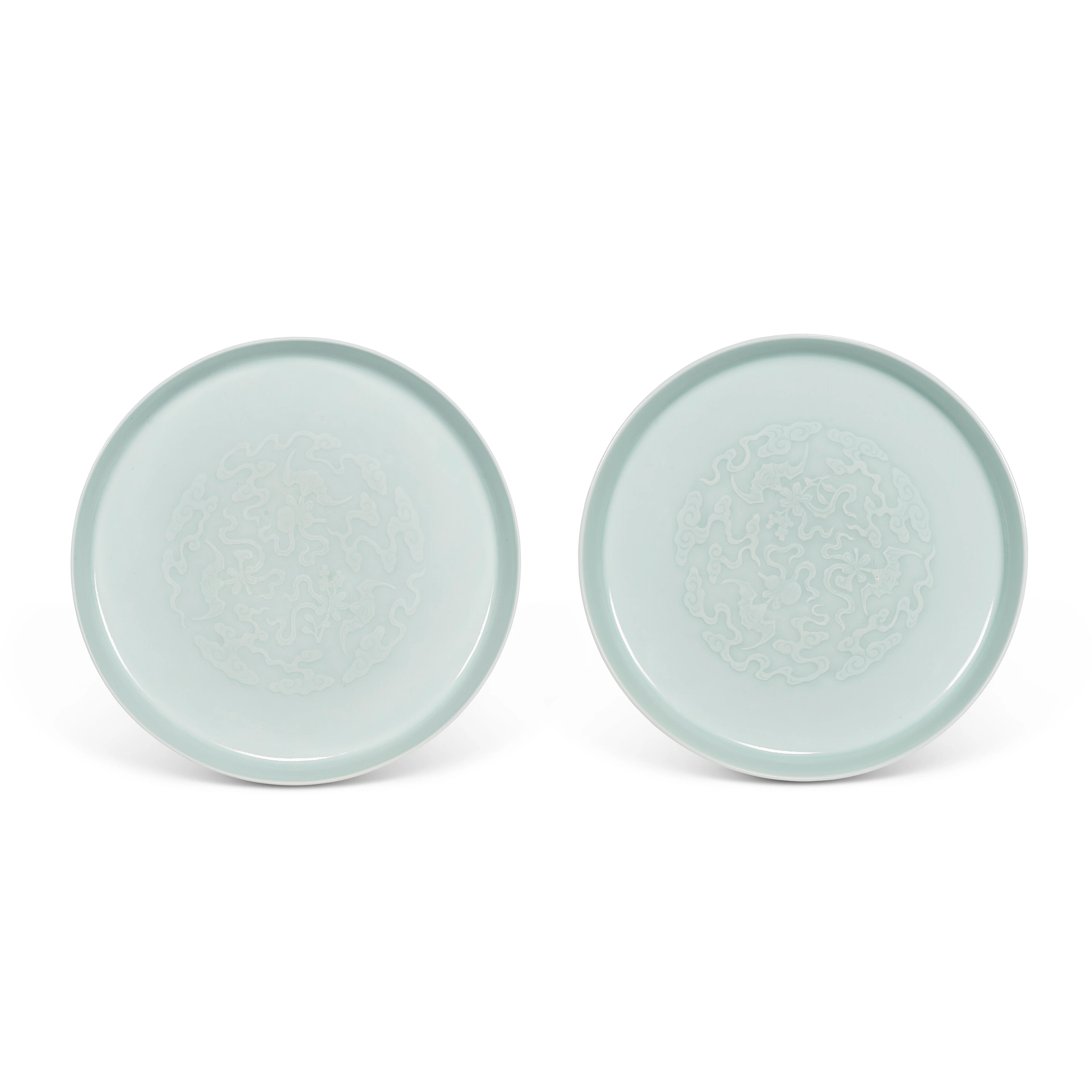 A Pair of Incised Celadon-Glazed ‘Bats and Clouds’ Dishes