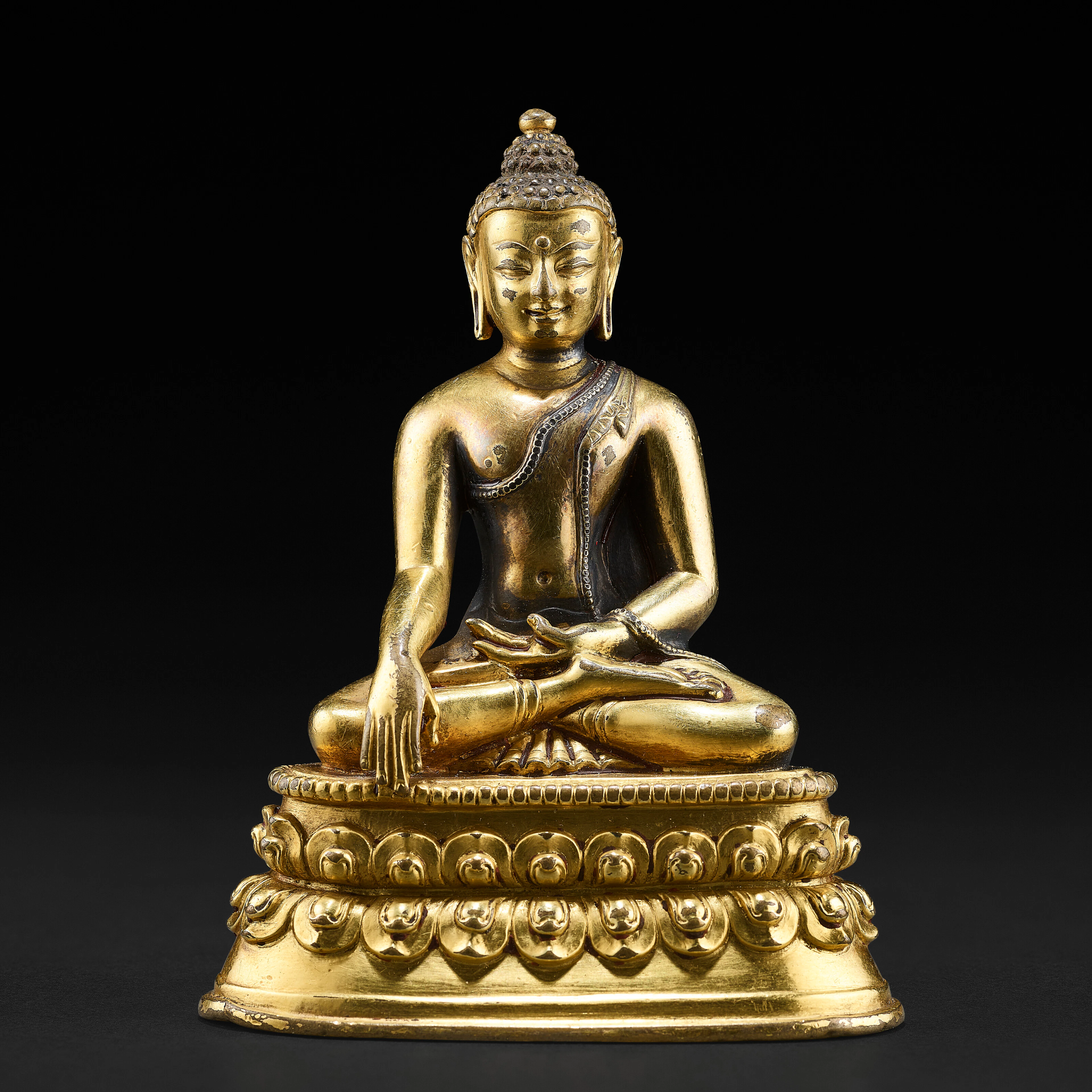 A Silver Inlaid Gilt Copper Alloy Figure of Shakyamuni Buddha