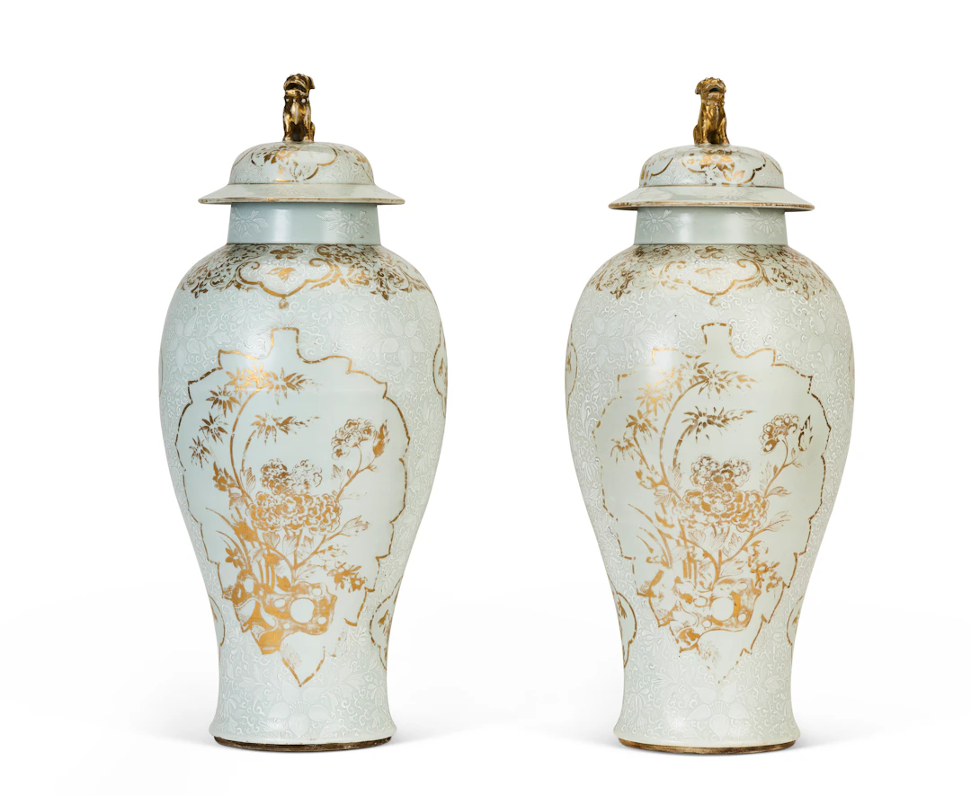 A Pair of Chinese Export Porcelain 'Bianco Sopra Bianco' Vases and Covers