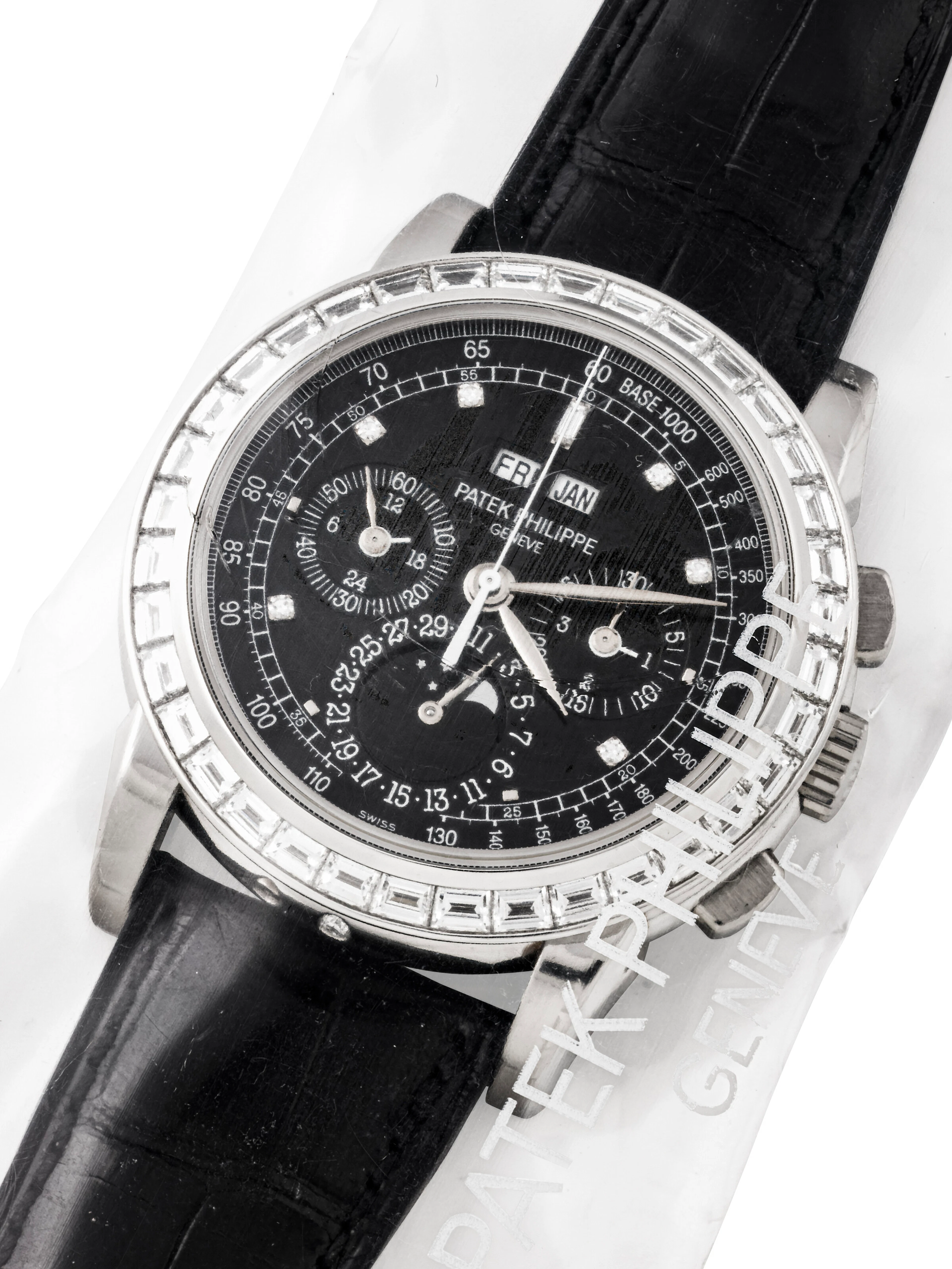 PATEK PHILIPPE. A RARE PLATINUM AND BAGUETTE-CUT DIAMOND-SET PERPETUAL