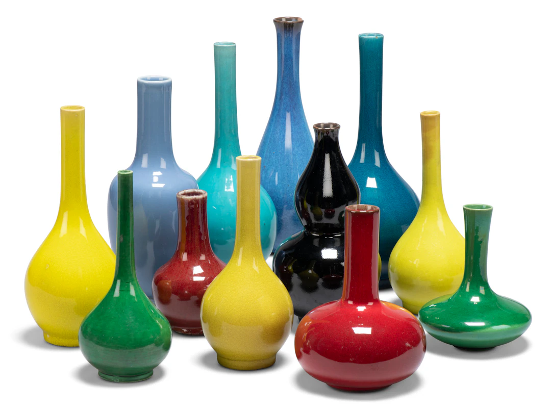 A Group of Twelve Chinese Monochrome Glazed Bottle Vases