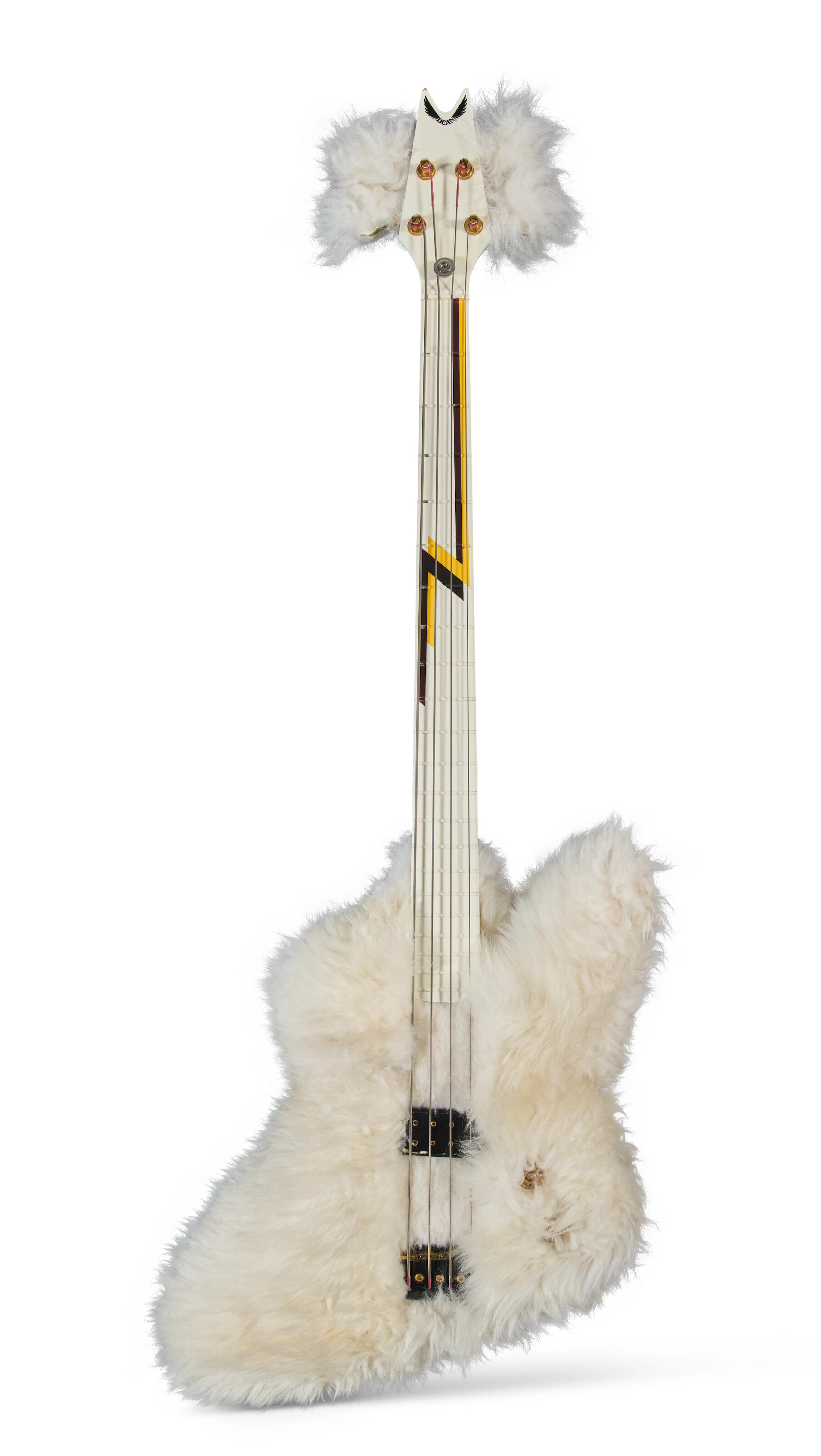 DUSTY HILL: THE SHEEPSKIN COVERED DEAN BASS GUITAR USED IN THE MUSIC