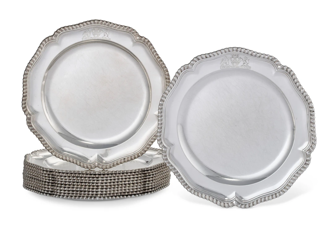 A Set of Twelve George Ii Silver Dinner Plates