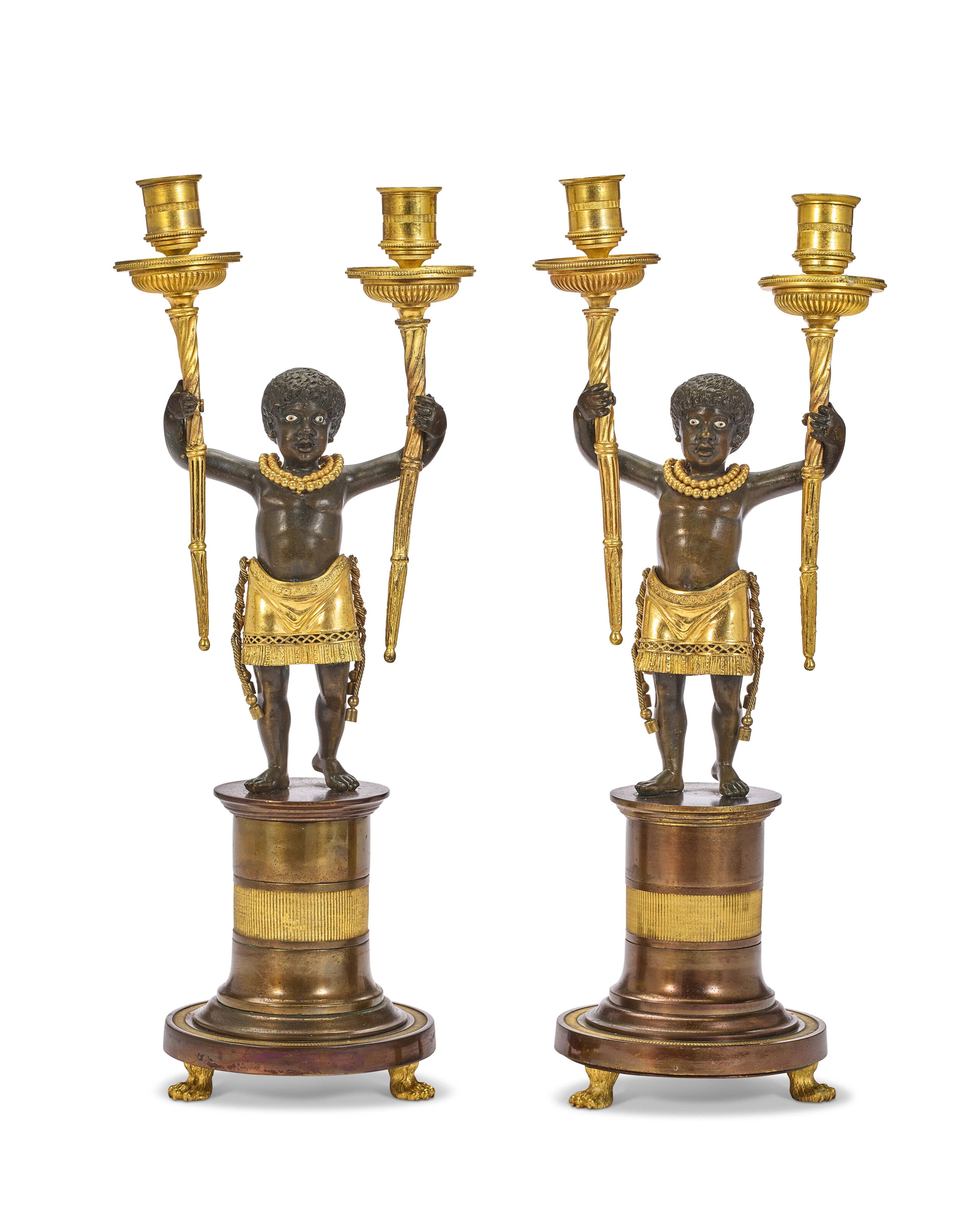 A Pair of Consulat Ormolu and Patinated Bronze Two-Branch Candelabra